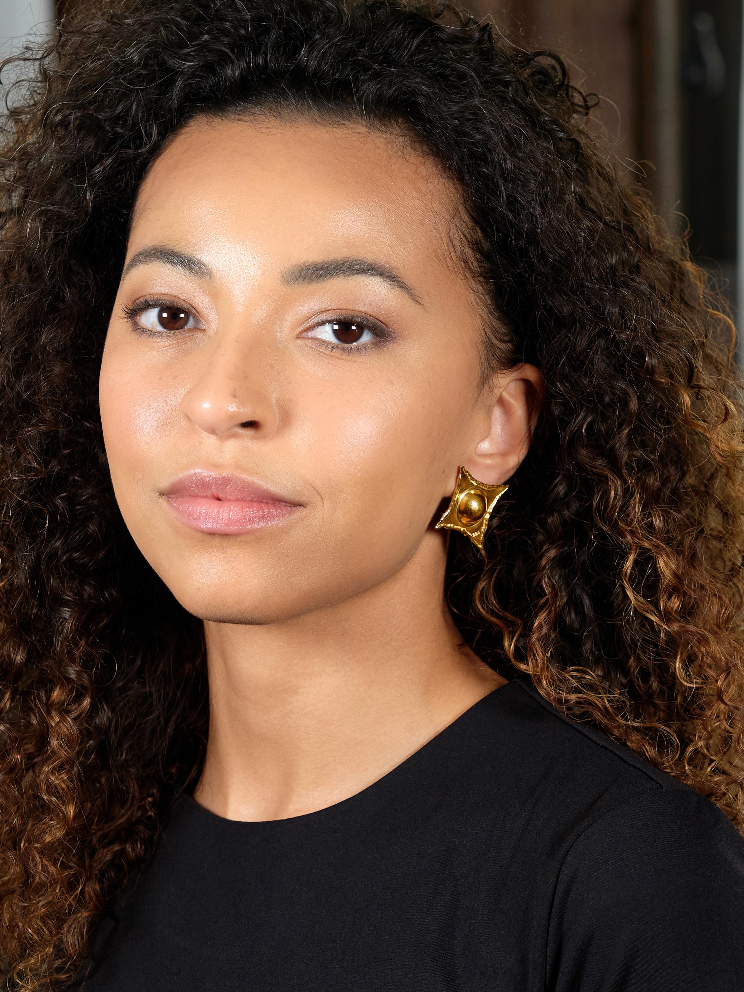 Jean Mahie 1990's 22 Karat Yellow Gold Domed Star Vintage Earrings