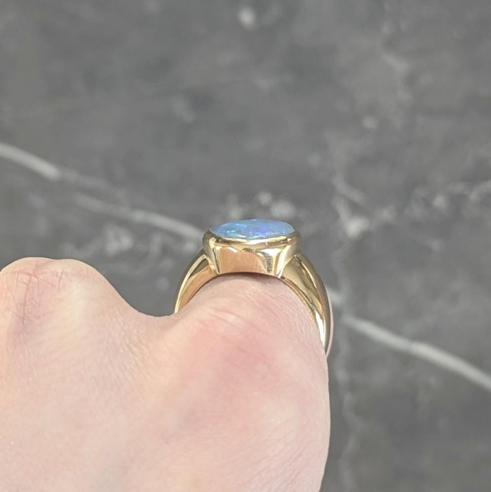 Contemporary Black Opal 18 Karat Yellow Gold Puffed Bezel Gemstone Ring