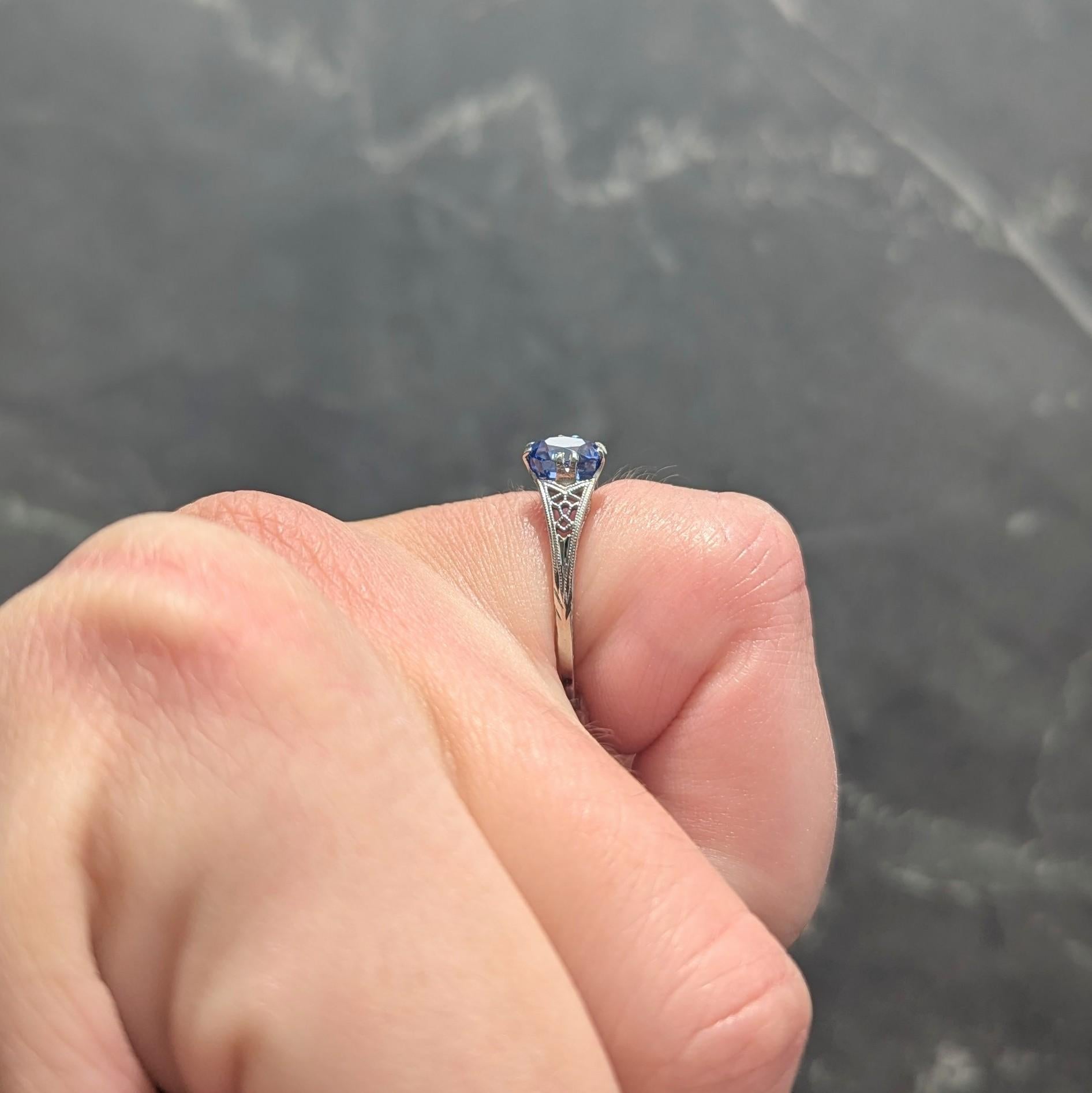 Art Deco 0.93 CTW Oval Cut Sapphire 18 Karat White Gold Vintage Lotus Ring