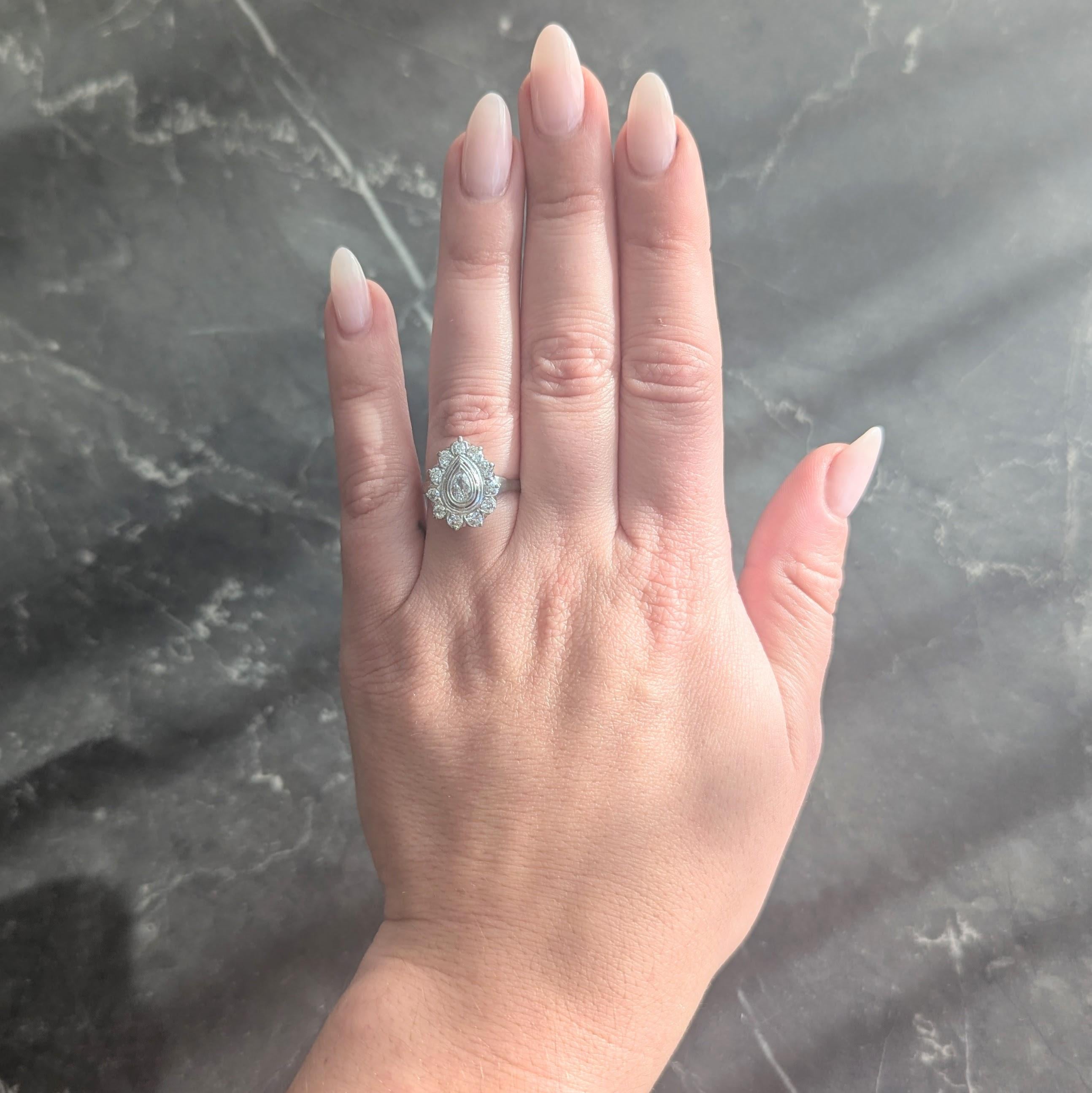 Mid-Century 0.88 CTW Pear Cut Diamond Platinum Vintage Halo Ring