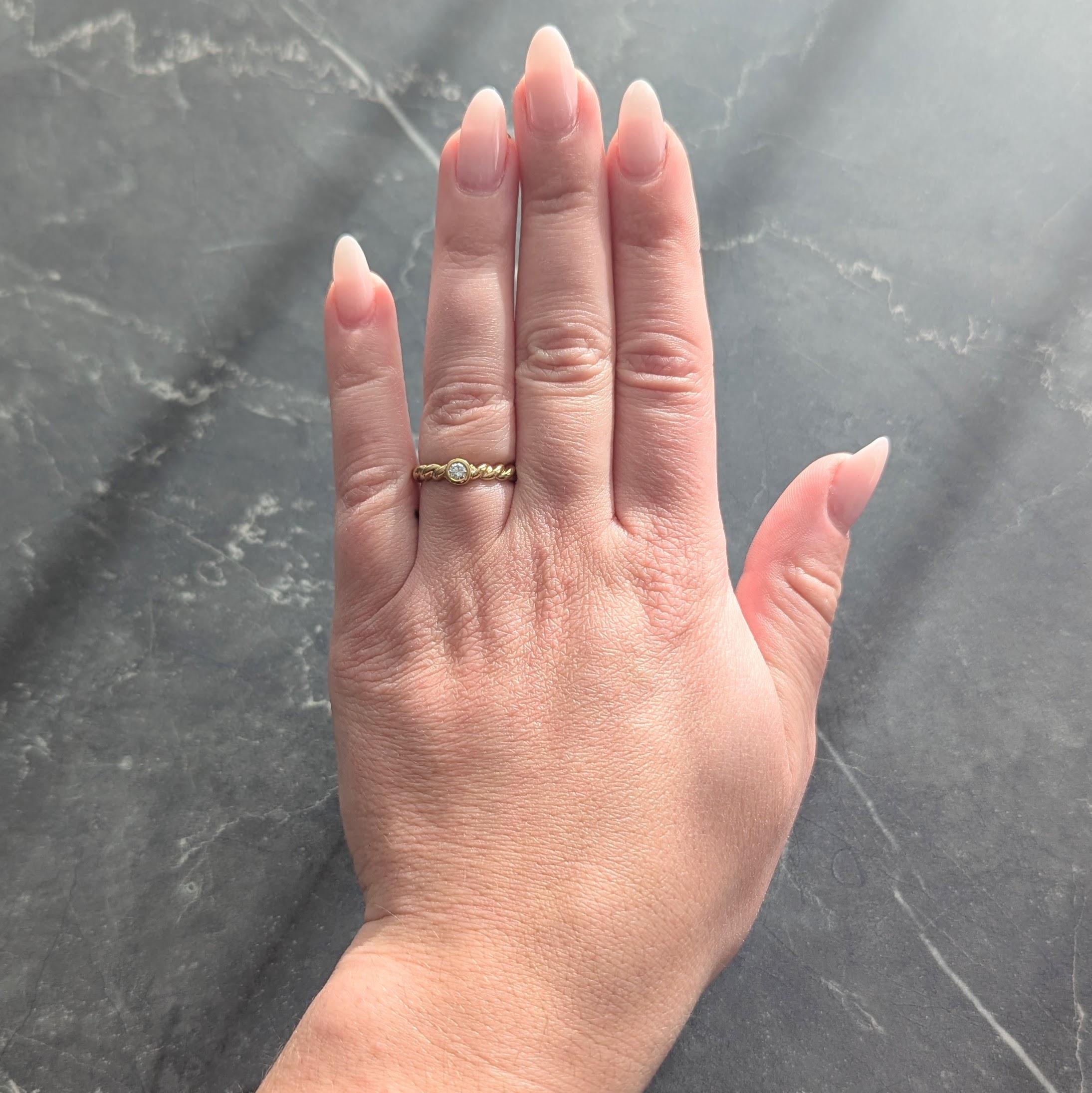 Tiffany & Co. 1990's Diamond 18 Karat Yellow Gold Vintage Twisted Rope Band Ring