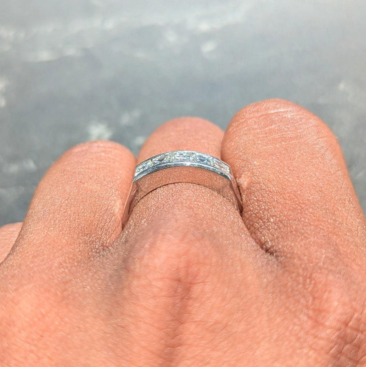 Contemporary 1.03 CTW Square Step Cut Diamond Platinum Channel Band Ring