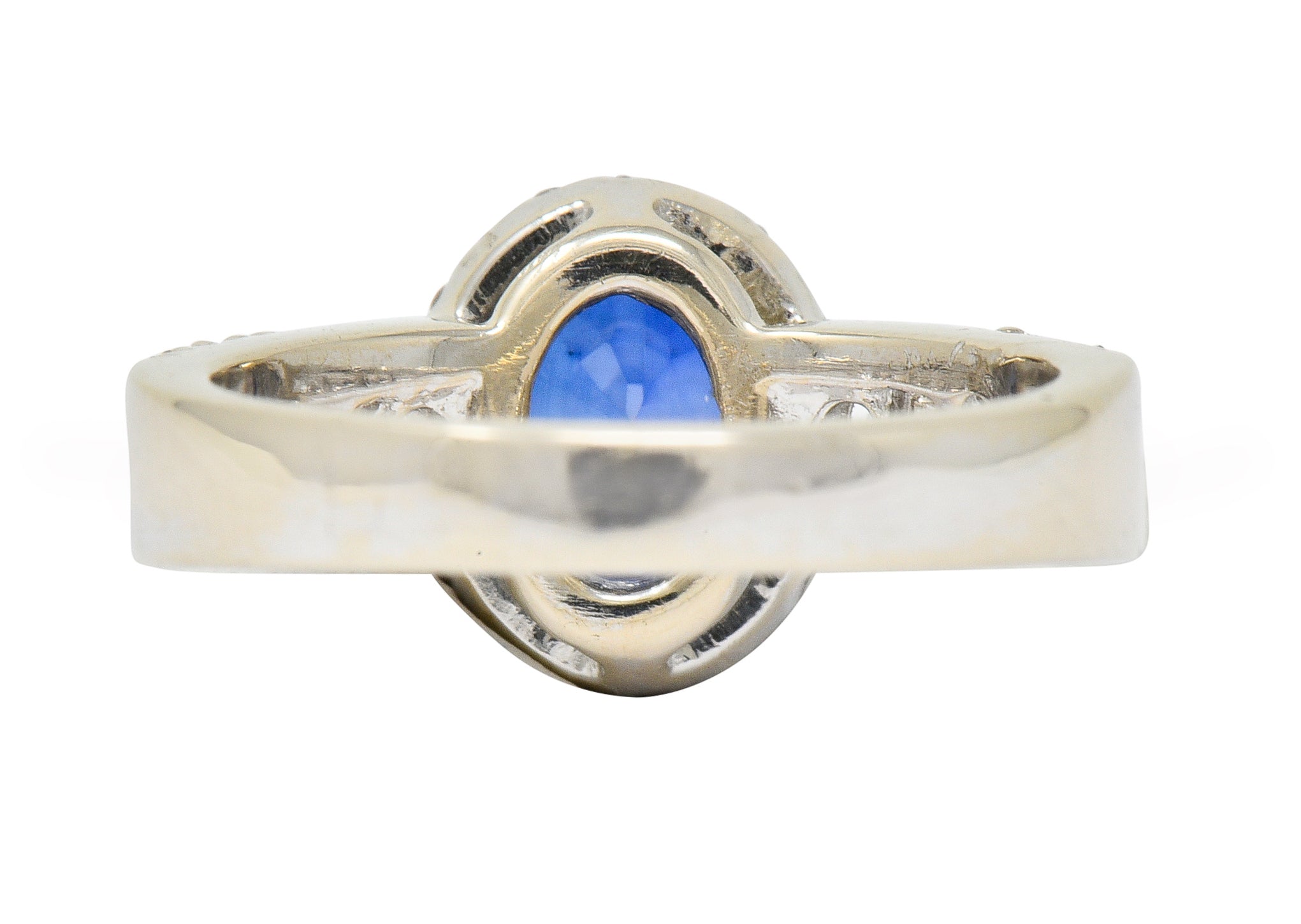 Contemporary 2.31 CTW Sapphire Diamond 18 Karat White Gold Halo Ring - Wilson's Estate Jewelry