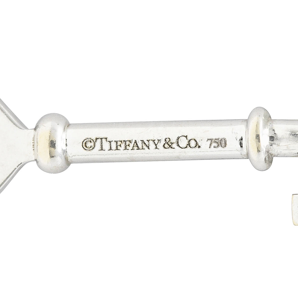 Tiffany & Co. Diamond 18 Karat White Gold Heart Key Pendant Wilson's Estate Jewelry
