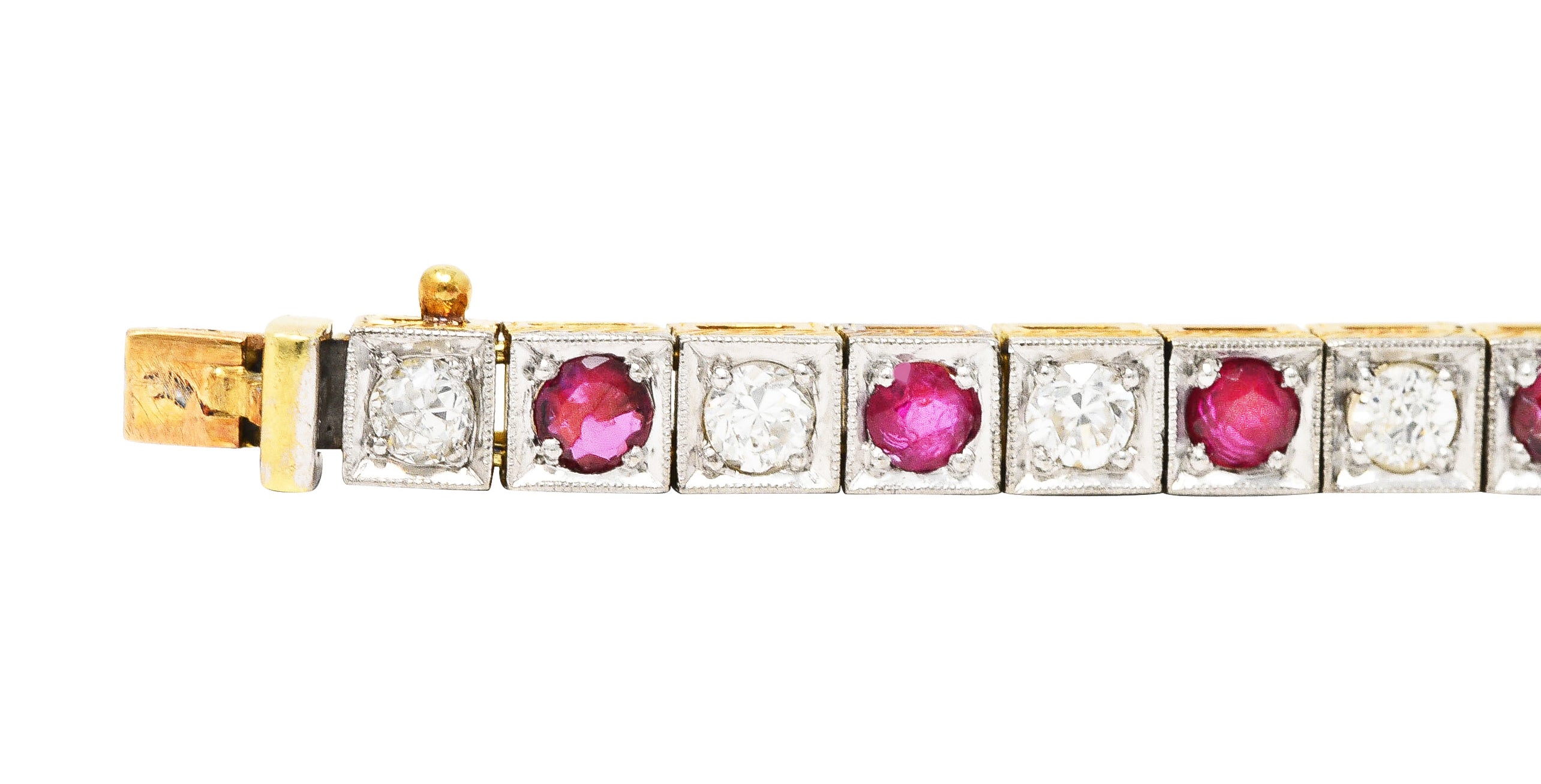 Edwardian 5.32 CTW Ruby Diamond Platinum-Topped 18 Karat Yellow Gold Milgrain Antique Line Bracelet Wilson's Estate Jewelry