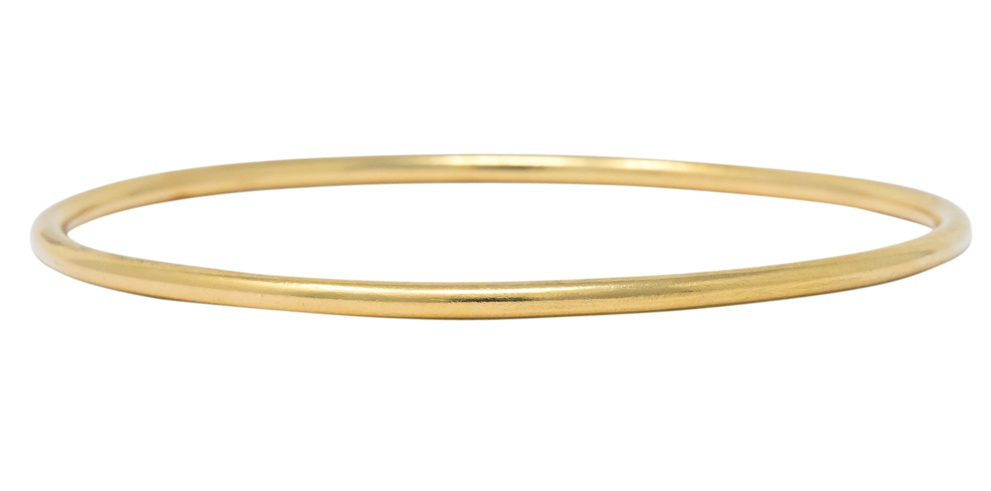 Four Vintage 14 Karat Yellow Gold Decorated Bangle Bracelets - Wilson's Estate Jewelry