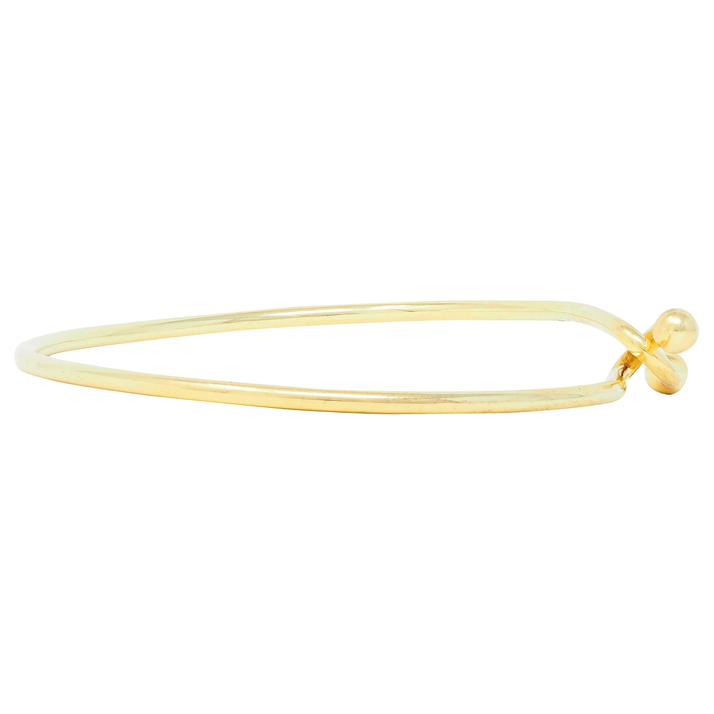 Tiffany & Co. 2000's 18 Karat Yellow Gold Interlocking Hook Bangle Bracelet