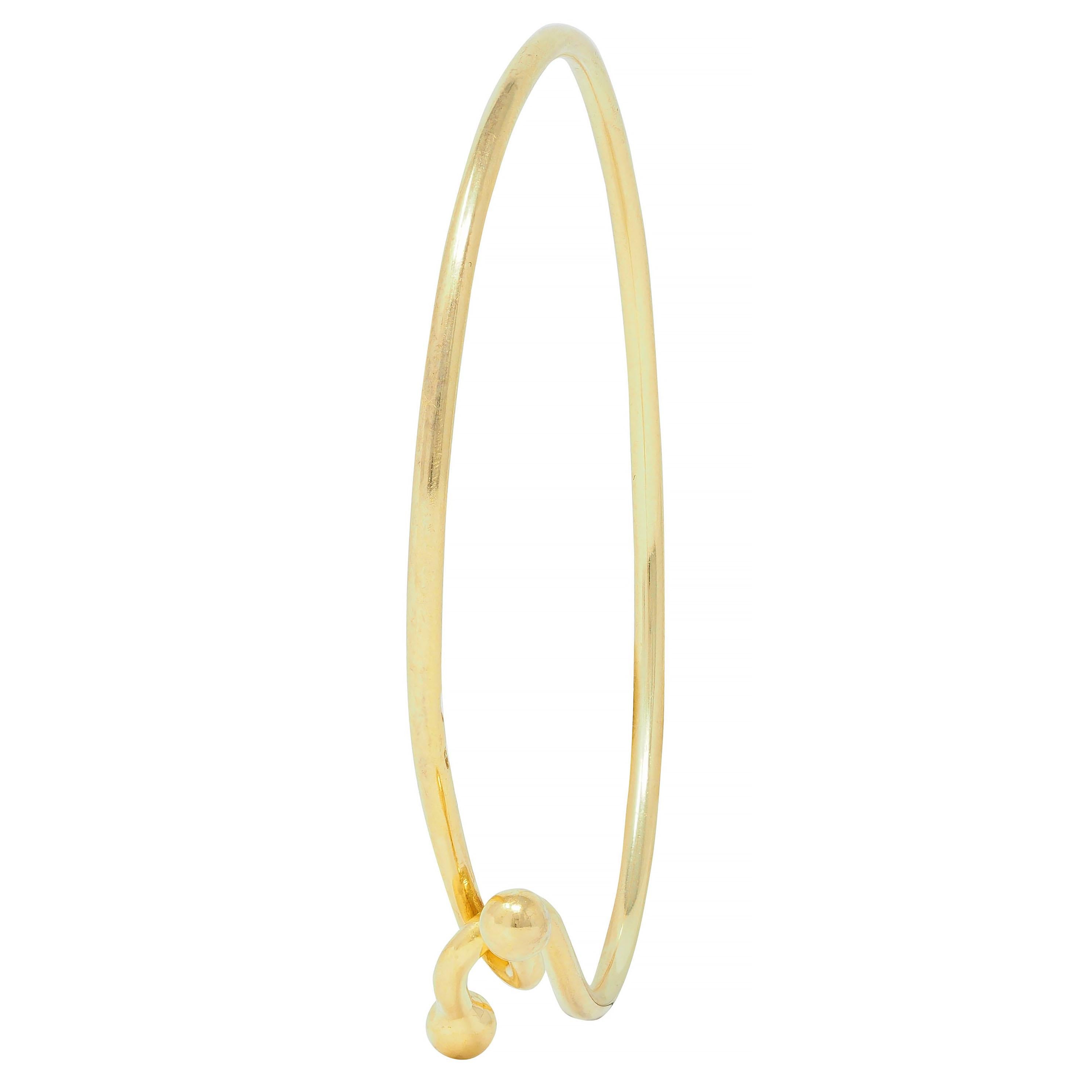 Tiffany & Co. 2000's 18 Karat Yellow Gold Interlocking Hook Bangle Bracelet