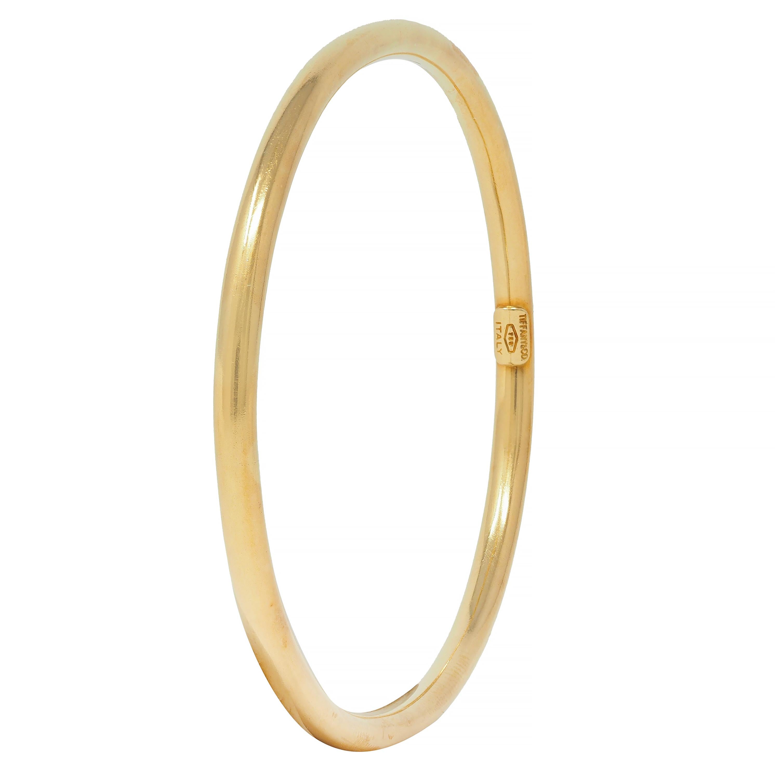 Tiffany & Co. 1990's 18 Karat Yellow Gold Vintage Oval Bangle Bracelet