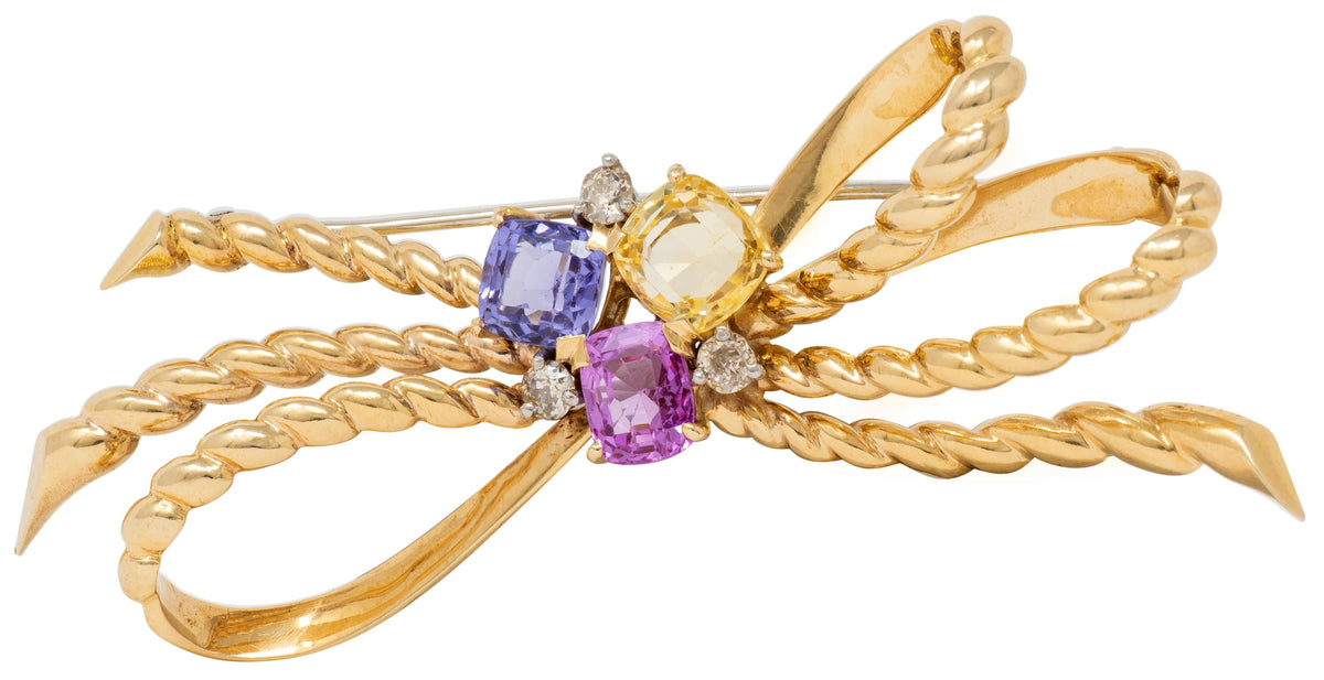 1960's Diamond Sapphire 14K Yellow Gold Platinum Vintage Twisted Bow Brooch