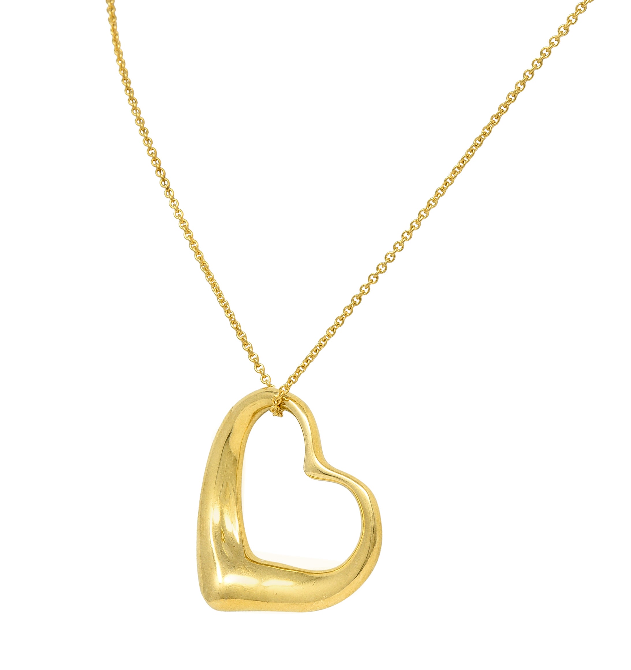 Elsa Peretti Tiffany & Co. 1990's 18 Karat Yellow Gold Open Heart Vintage Pendant Necklace Wilson's Estate Jewelry