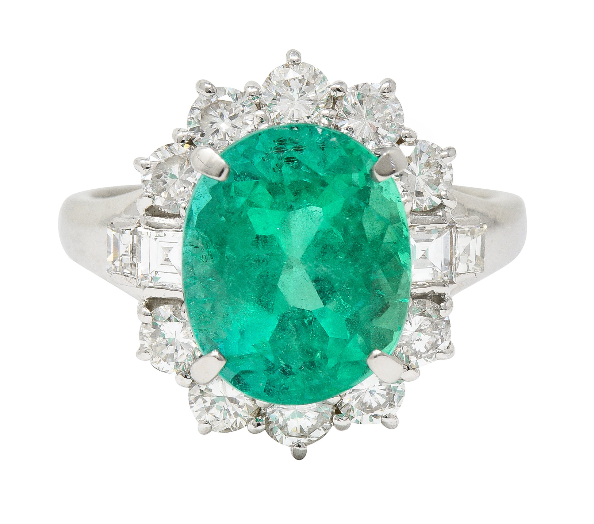 Contemporary 6.77 CTW Columbian Emerald Diamond Platinum Halo Ring GIA Wilson's Estate Jewelry