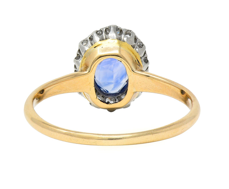 Edwardian 1.44 CTW Oval Cut Sapphire Diamond Platinum-Topped Antique Halo Ring Wilson's Estate Jewelry