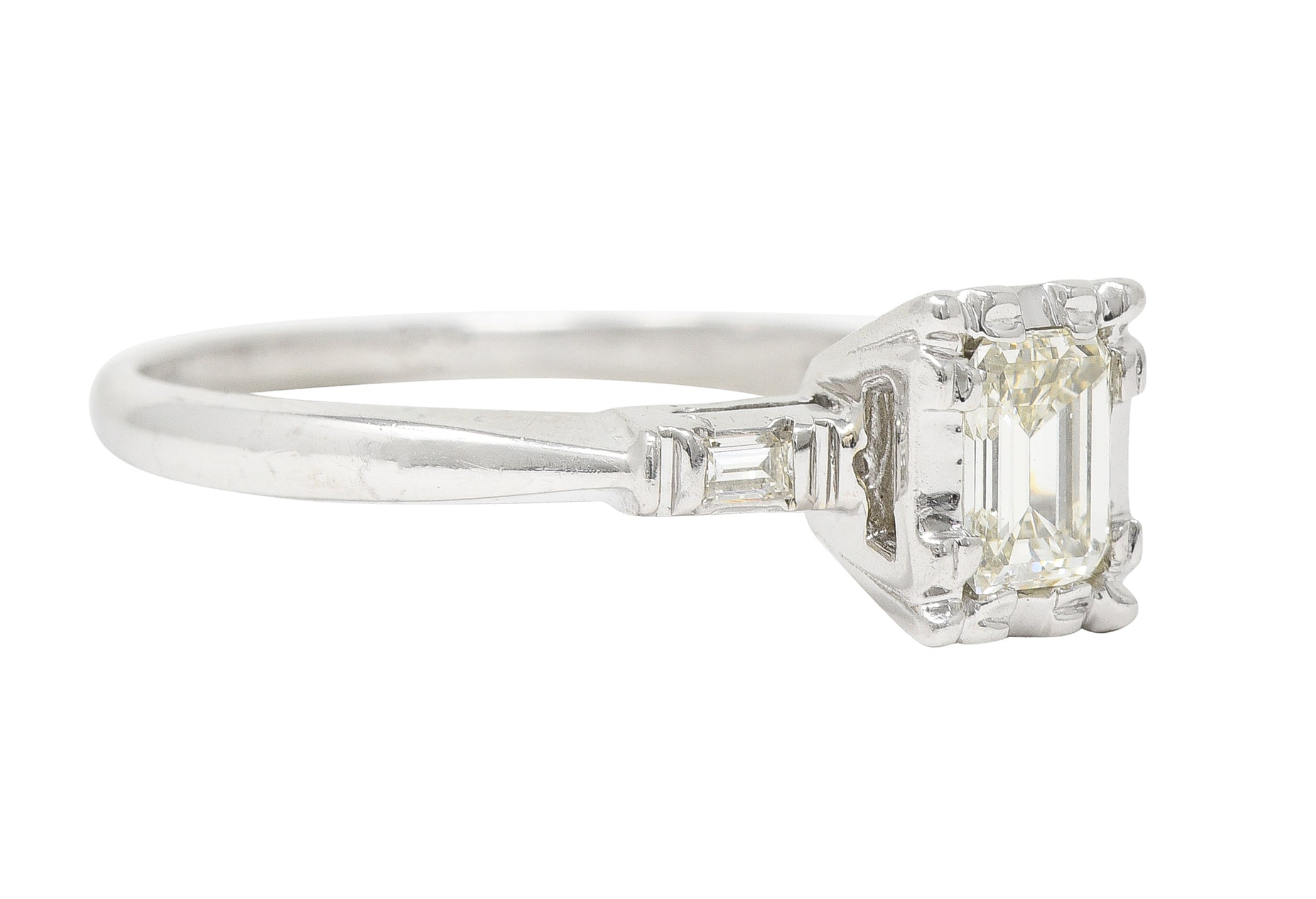 S. Wechter Co. Mid-Century 0.62 CTW Emerald Cut Diamond 14 Karat White Gold Three Stone Vintage Engagement Ring Wilson's Estate Jewelry