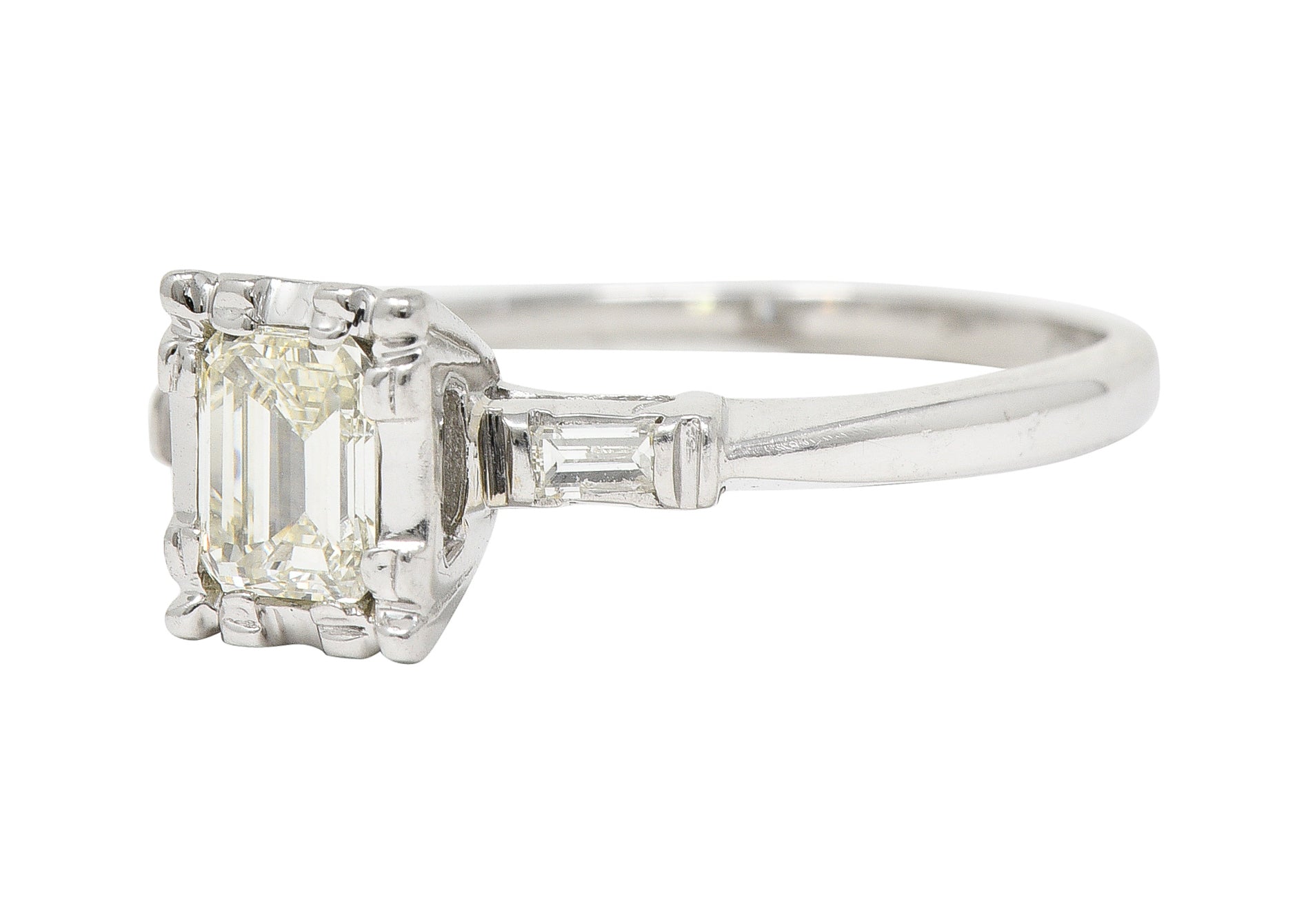 S. Wechter Co. Mid-Century 0.62 CTW Emerald Cut Diamond 14 Karat White Gold Three Stone Vintage Engagement Ring Wilson's Estate Jewelry