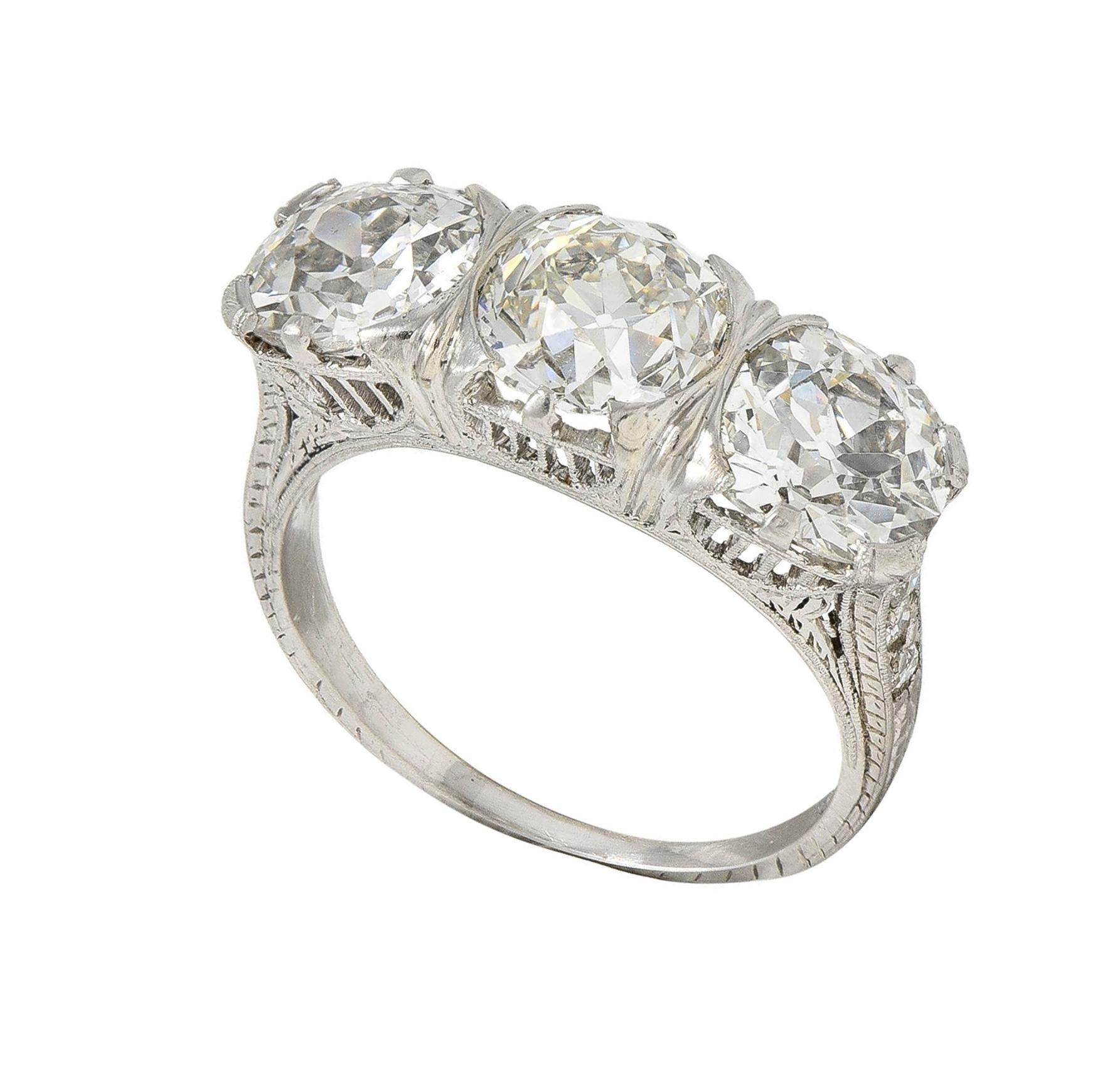 Edwardian 4.30 CTW Diamond Platinum Antique Orange Blossom Three Stone Band Ring