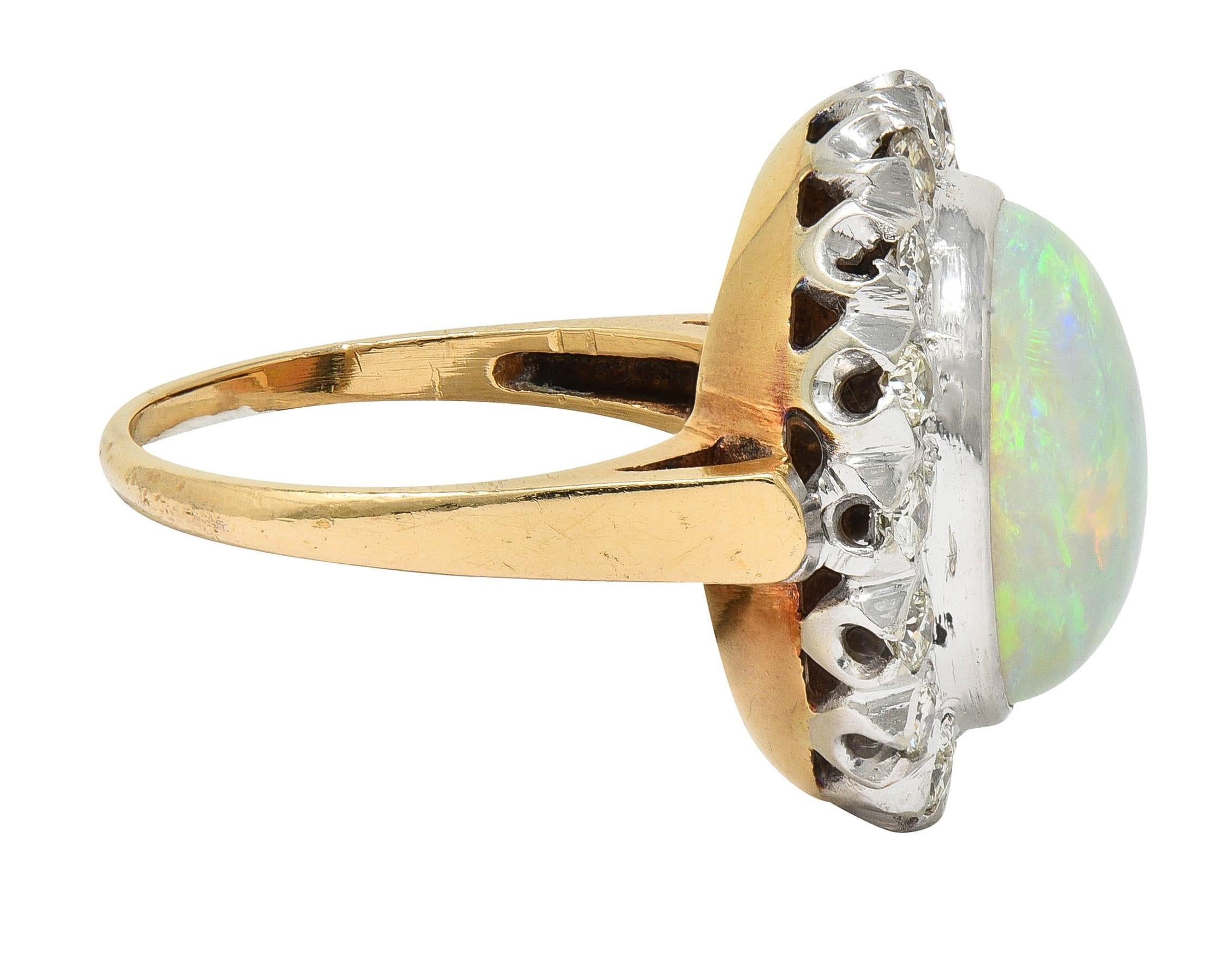 1940's Opal Diamond 14 Karat Two-Tone Gold Vintage Halo Ring