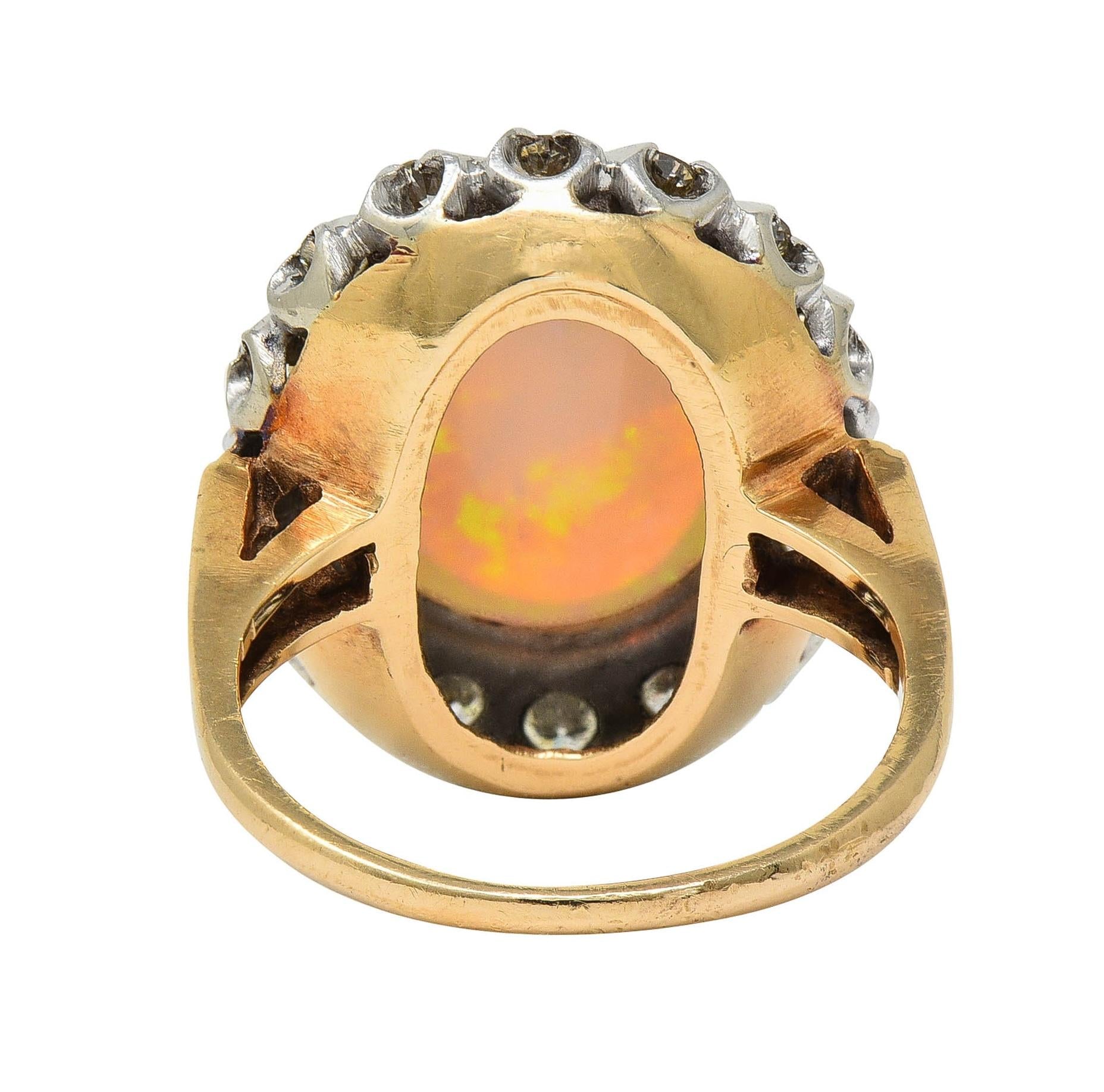 1940's Opal Diamond 14 Karat Two-Tone Gold Vintage Halo Ring