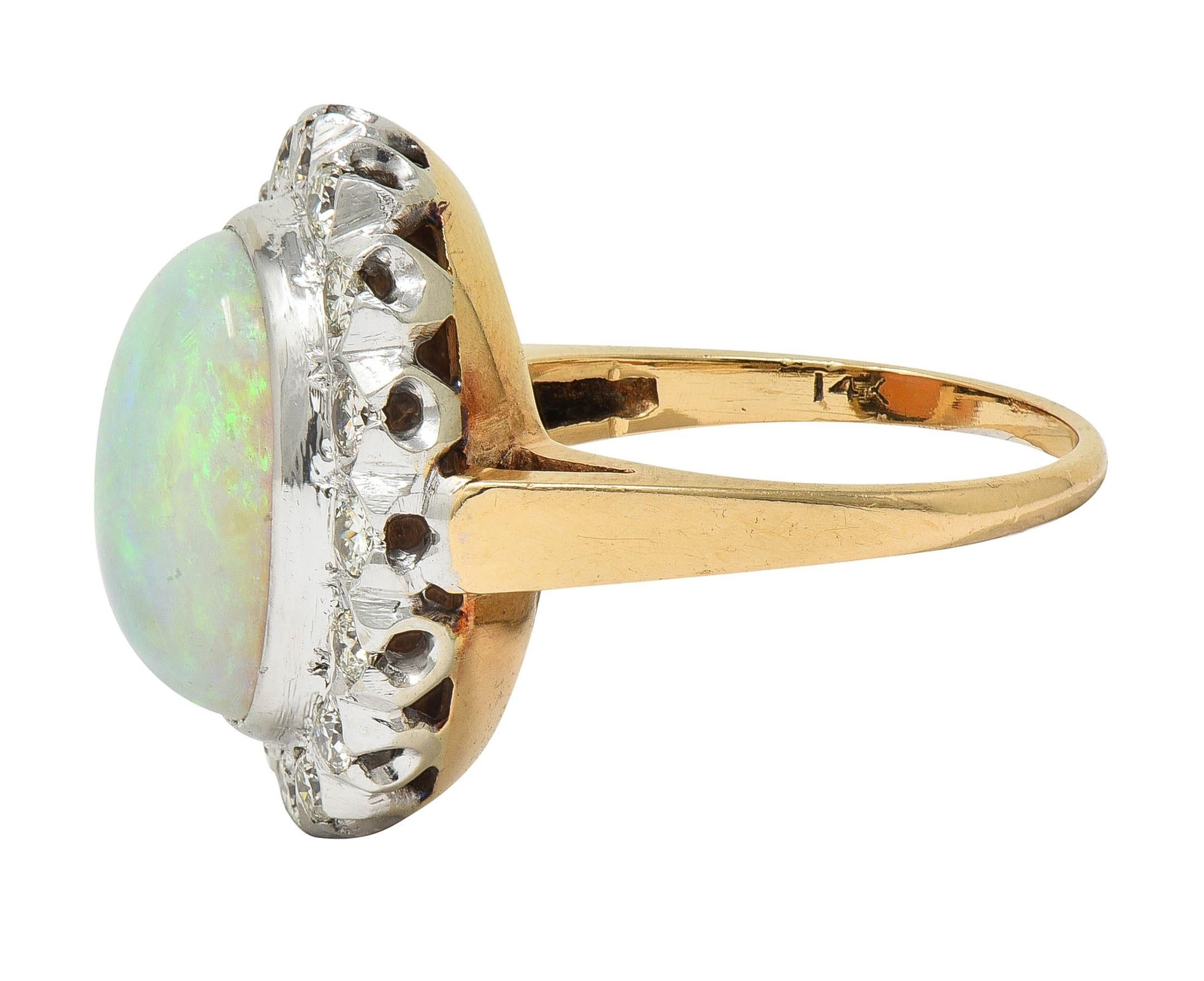 1940's Opal Diamond 14 Karat Two-Tone Gold Vintage Halo Ring