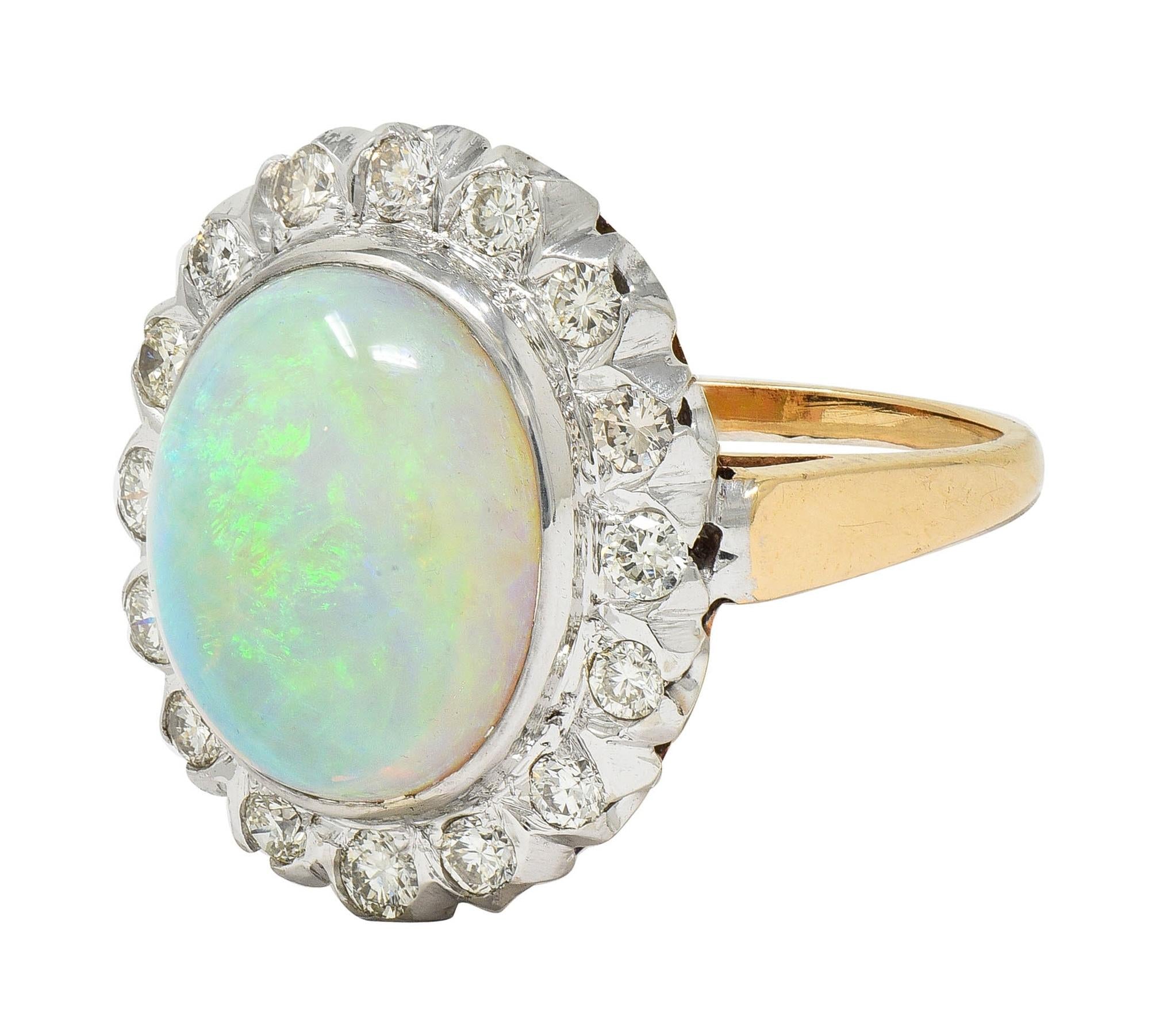 1940's Opal Diamond 14 Karat Two-Tone Gold Vintage Halo Ring