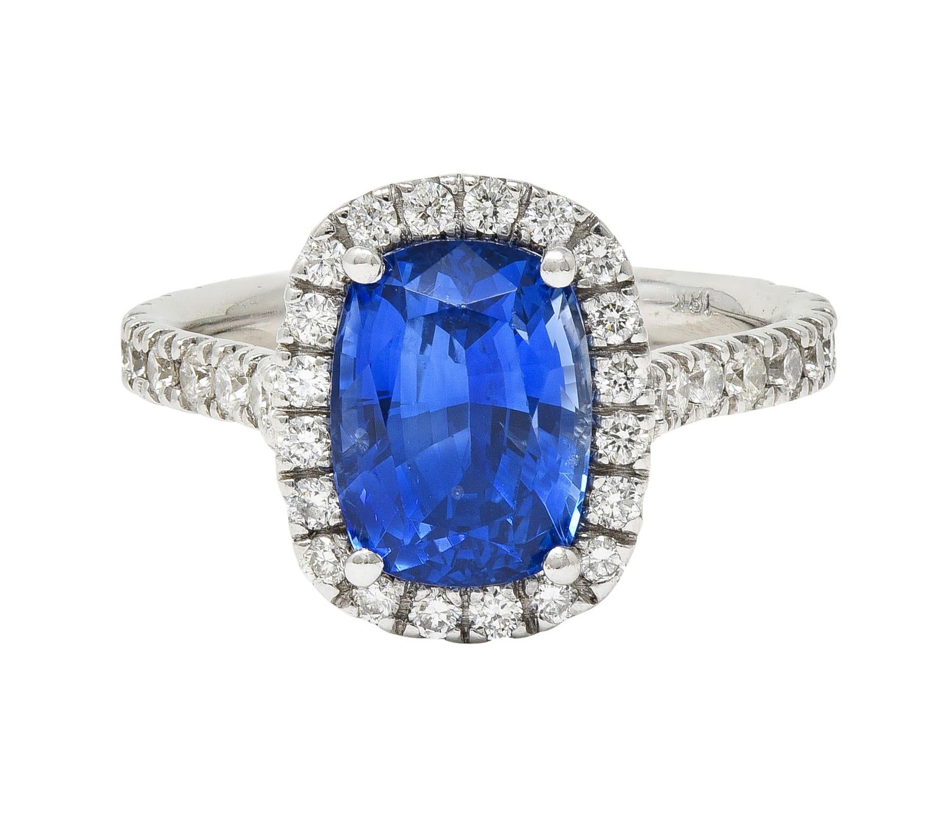 Contemporary 4.67 CTW Sapphire Diamond 18 Karat White Gold Halo Ring