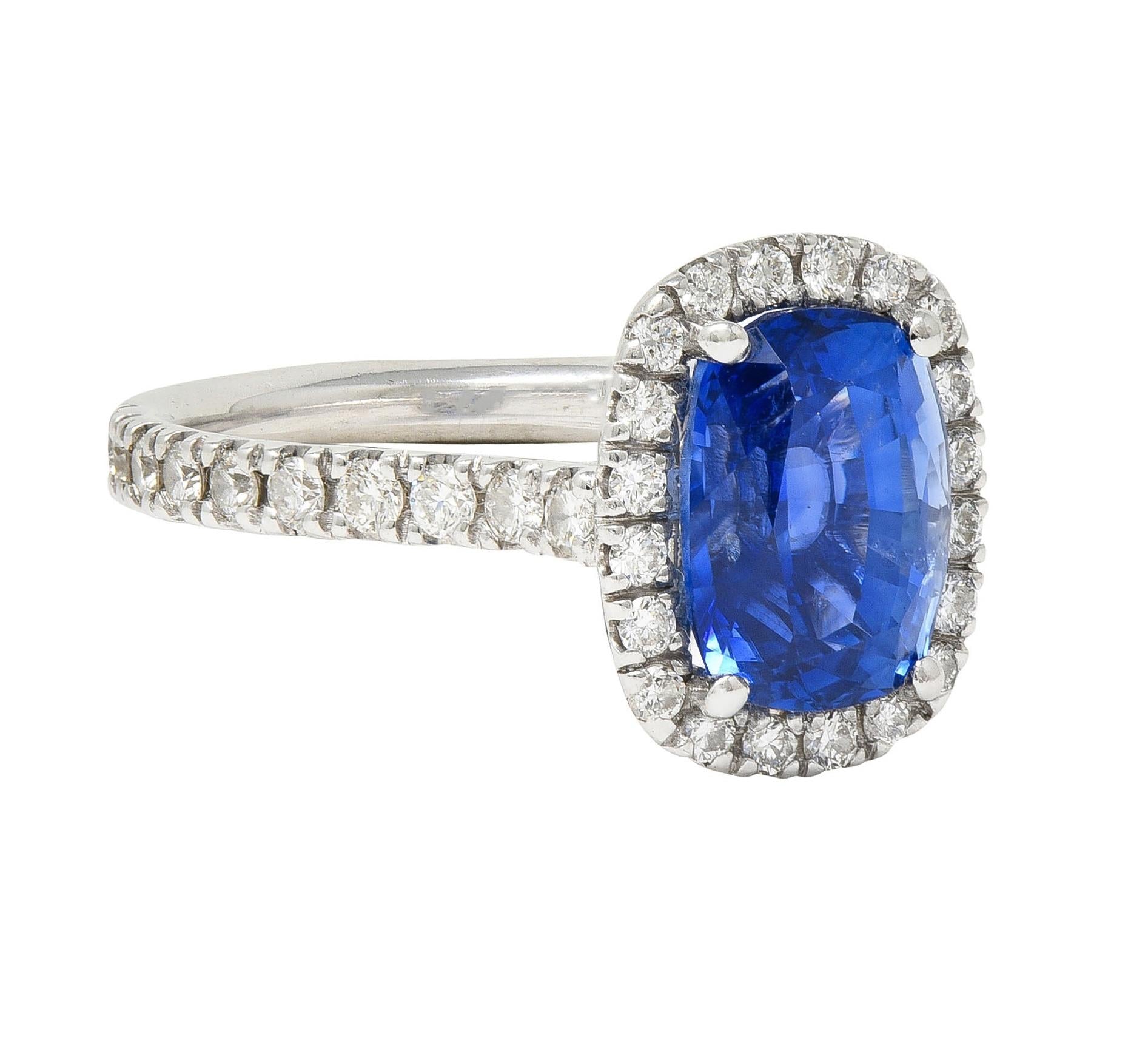 Contemporary 4.67 CTW Sapphire Diamond 18 Karat White Gold Halo Ring