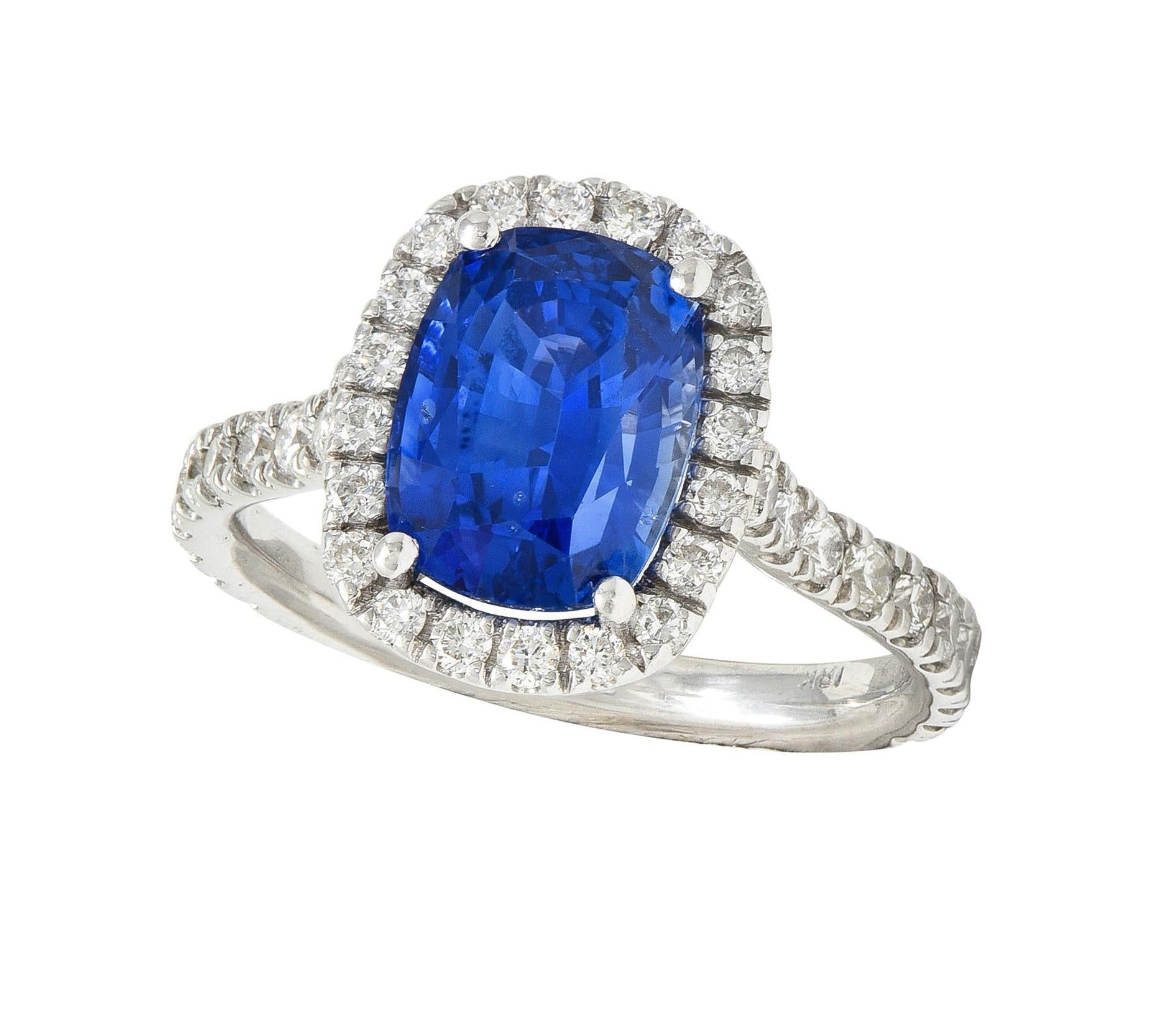 Contemporary 4.67 CTW Sapphire Diamond 18 Karat White Gold Halo Ring