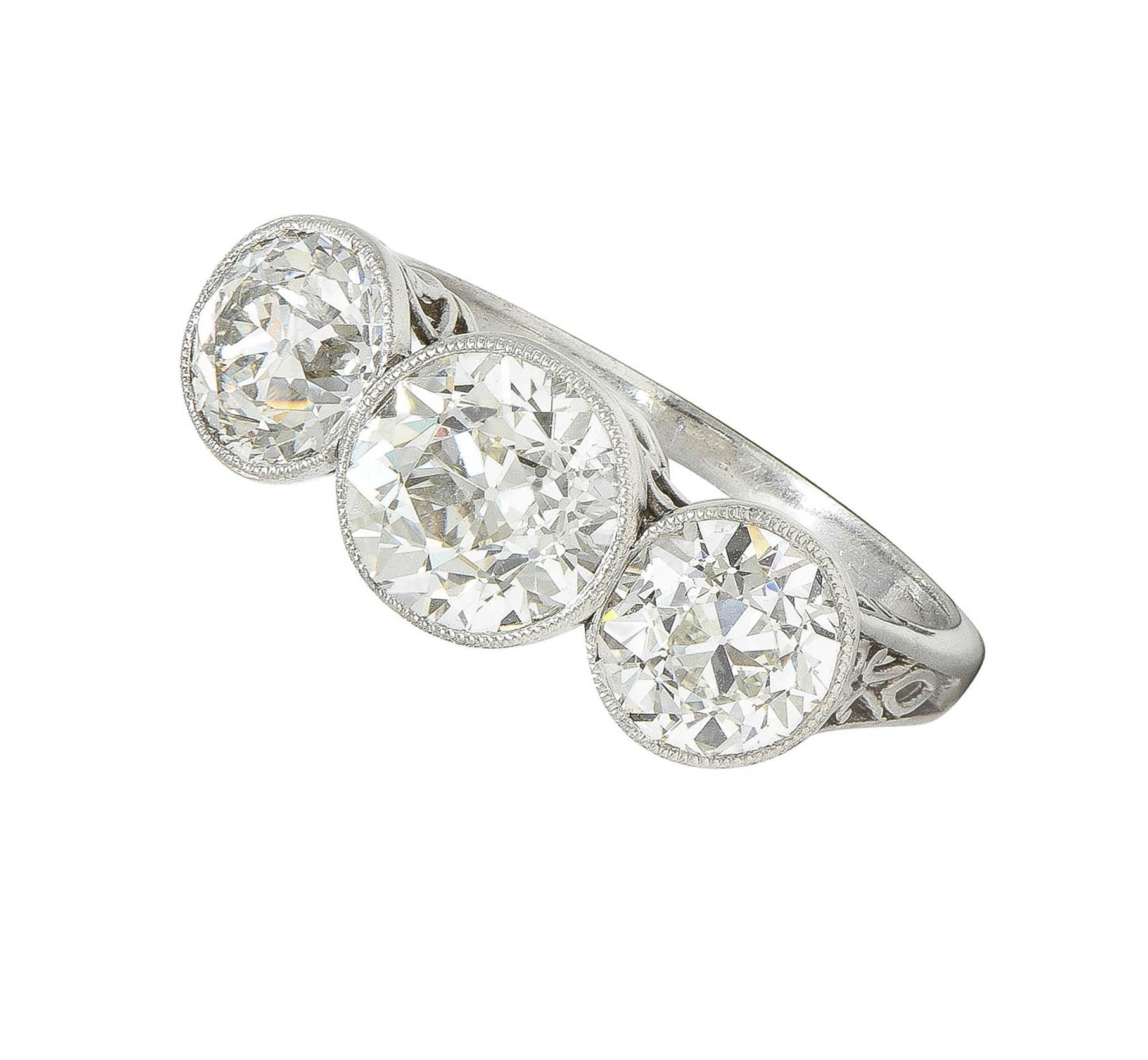 Edwardian 3.10 CTW Old Mine Cut Diamond Platinum Antique Three Stone Ring