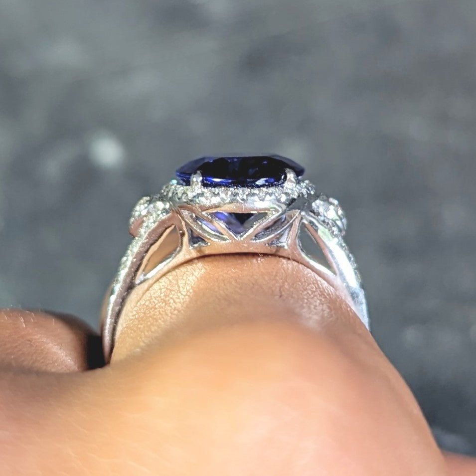 Contemporary 4.71 CTW Tanzanite Diamond 14 Karat White Gold Halo Ring Wilson's Estate Jewelry