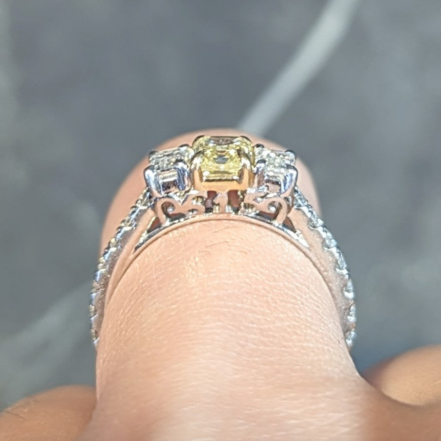 Contemporary 1.61 CTW Fancy Yellow Emerald Cut Diamond Platinum 18 Karat Numerical Engagement Ring Wilson's Estate Jewelry