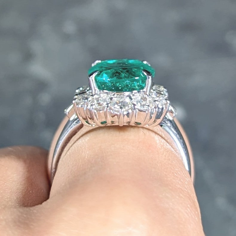 Contemporary 6.77 CTW Columbian Emerald Diamond Platinum Halo Ring GIA Wilson's Estate Jewelry