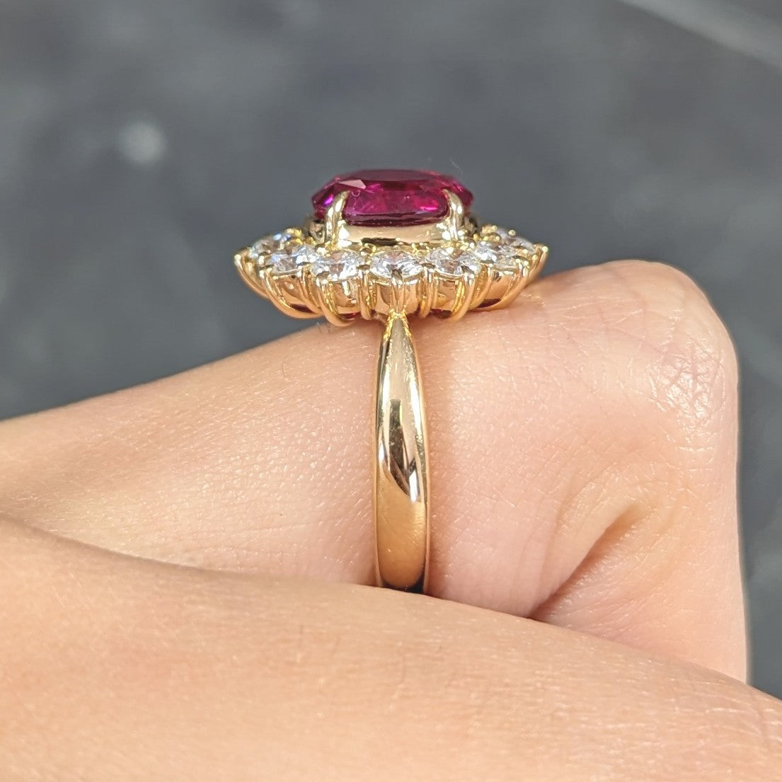 Contemporary 4.28 CTW Oval Step Cut Ruby Diamond 18 Karat Yellow Gold Halo Ring GIA Wilson's Estate Jewelry