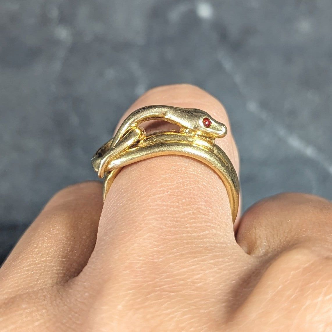 David Webb 1970's Ruby 18 Karat Yellow Gold Knotted Snake Vintage Band Ring Wilson's Estate Jewelry