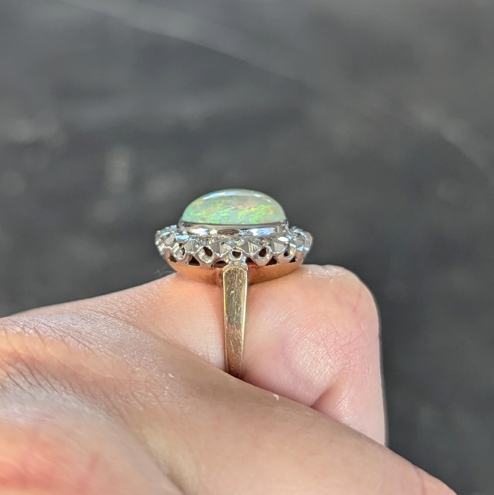 1940's Opal Diamond 14 Karat Two-Tone Gold Vintage Halo Ring