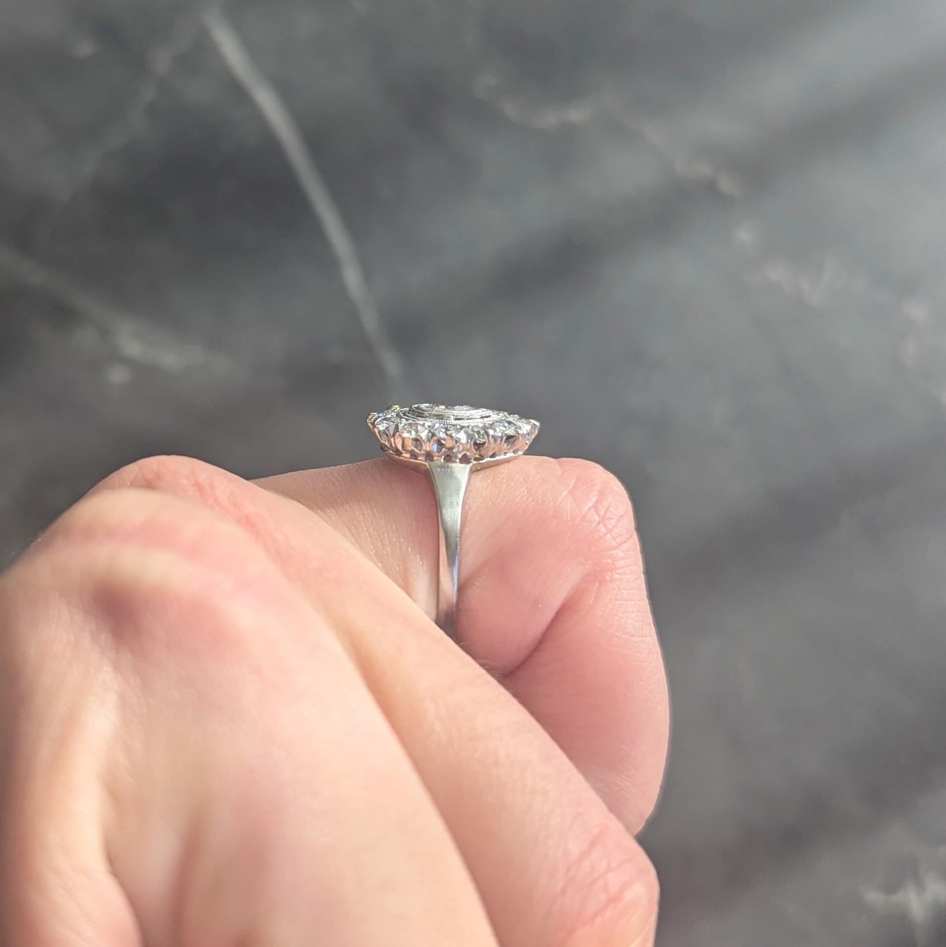 Mid-Century 0.88 CTW Pear Cut Diamond Platinum Vintage Halo Ring