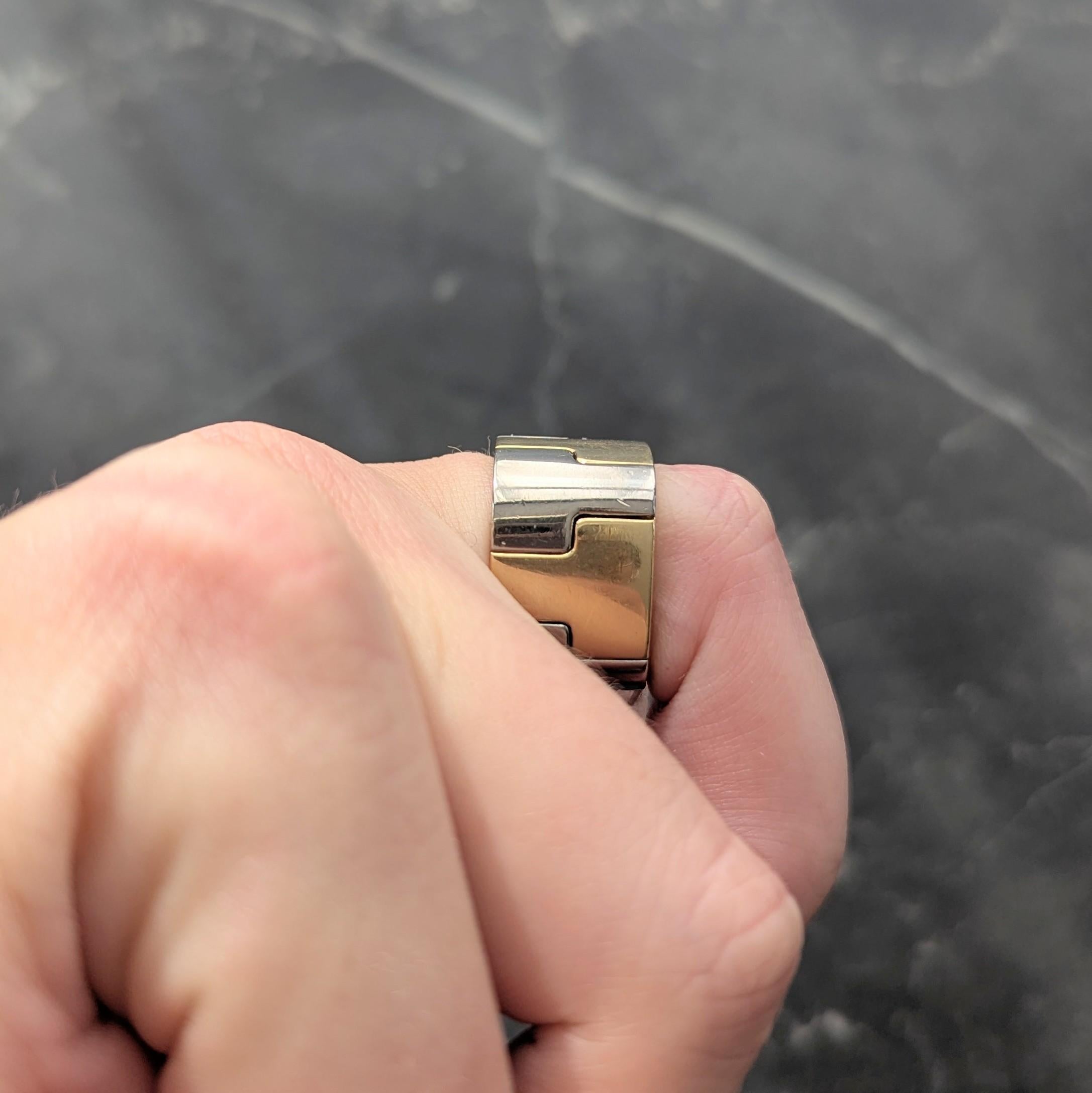 Gubelin by Paul Binder 1970's 18 Karat Two-Tone Gold Vintage T Puzzle Band Ring