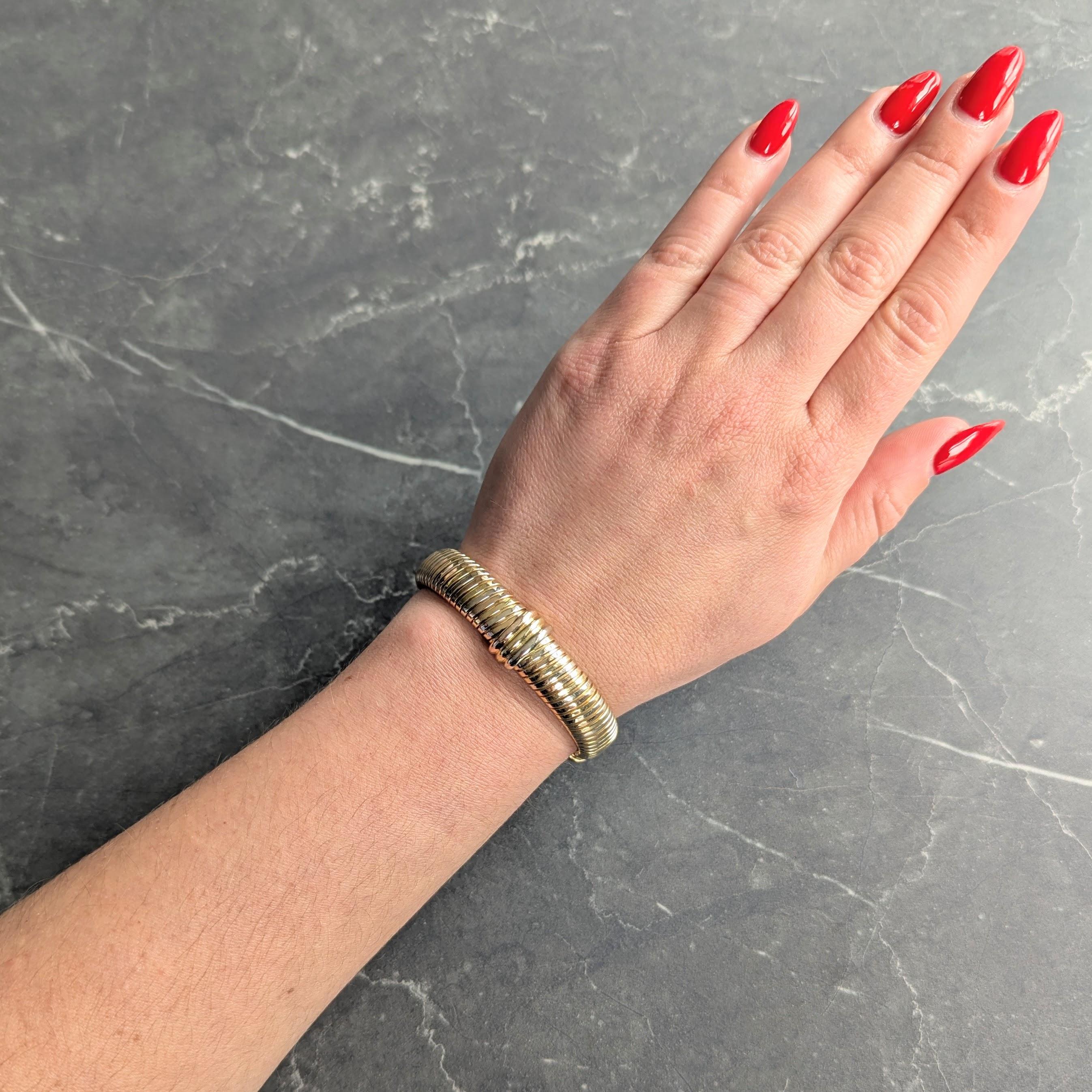 Cartier 1980's Tri-Colored  18 Karat Yellow White Gold Vintage Tubogas Bracelet