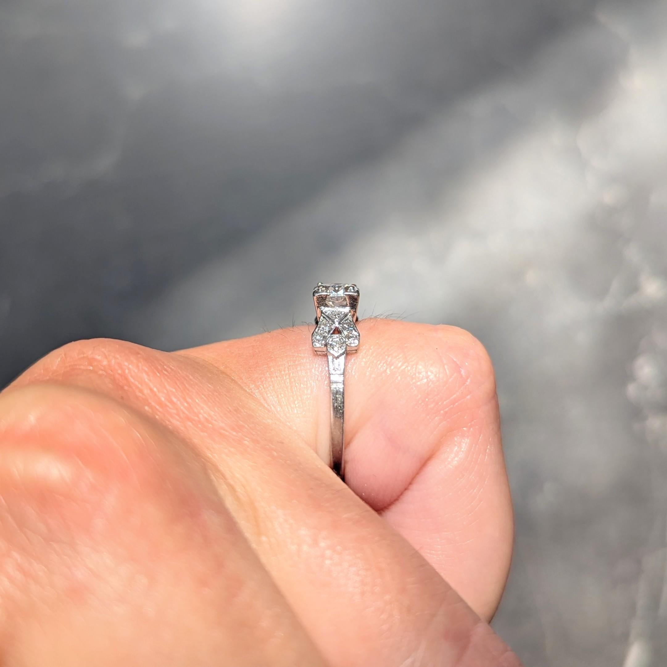 Art Deco 0.64 CTW Transitional Cut Diamond Platinum Buckle Engagement Ring