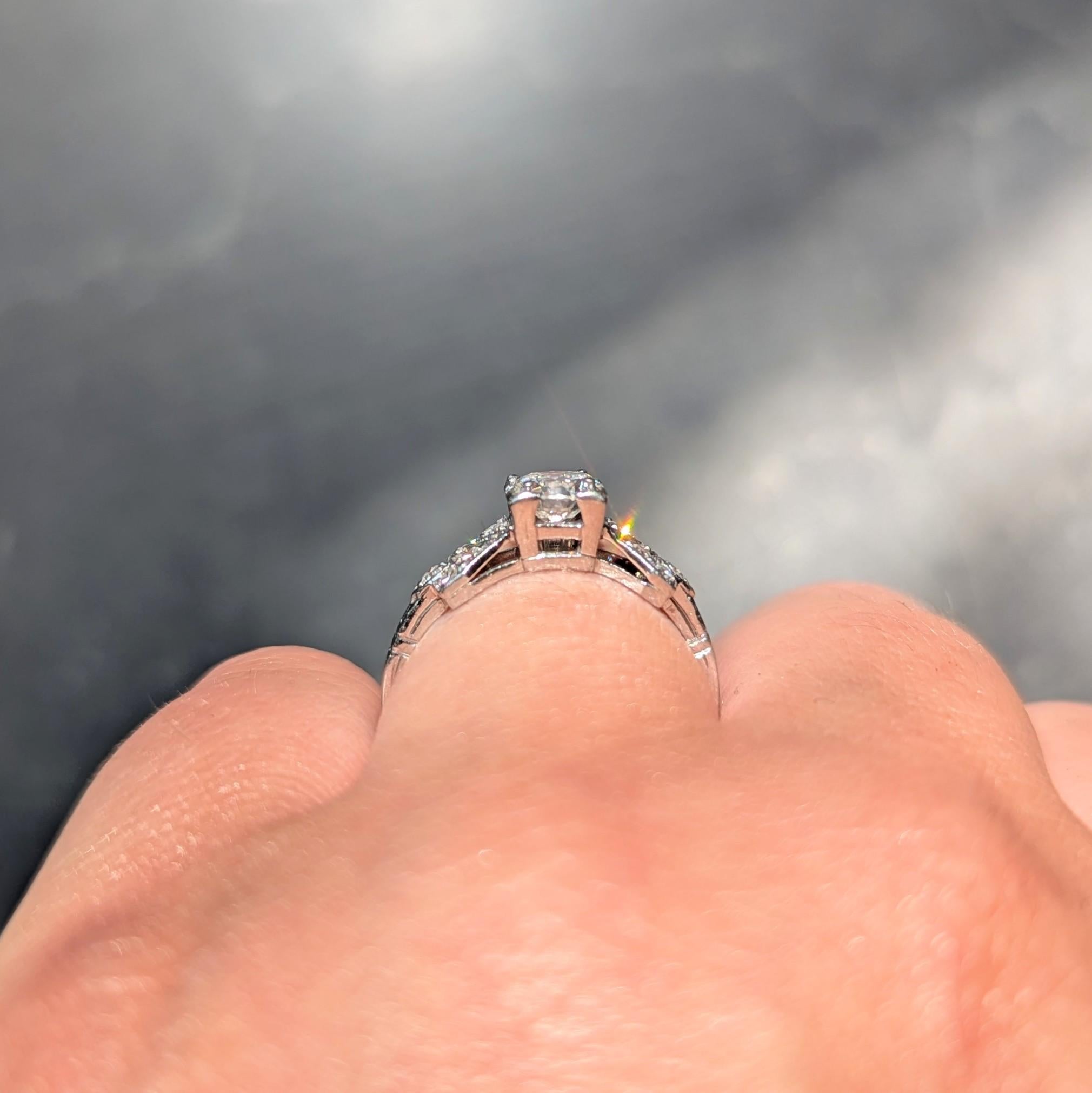 Art Deco 0.64 CTW Transitional Cut Diamond Platinum Buckle Engagement Ring