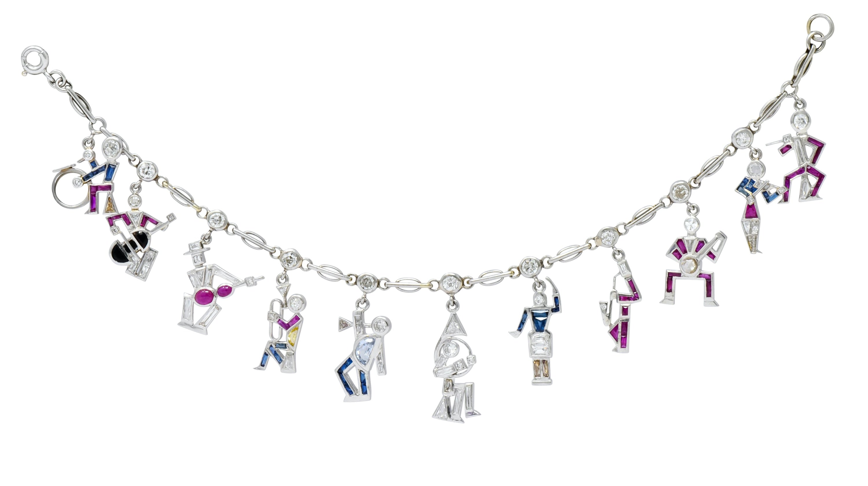 Retro Diamond Ruby Sapphire Platinum Jazz Band Musical Charm Bracelet Circa 1940s - Wilson's Estate Jewelry