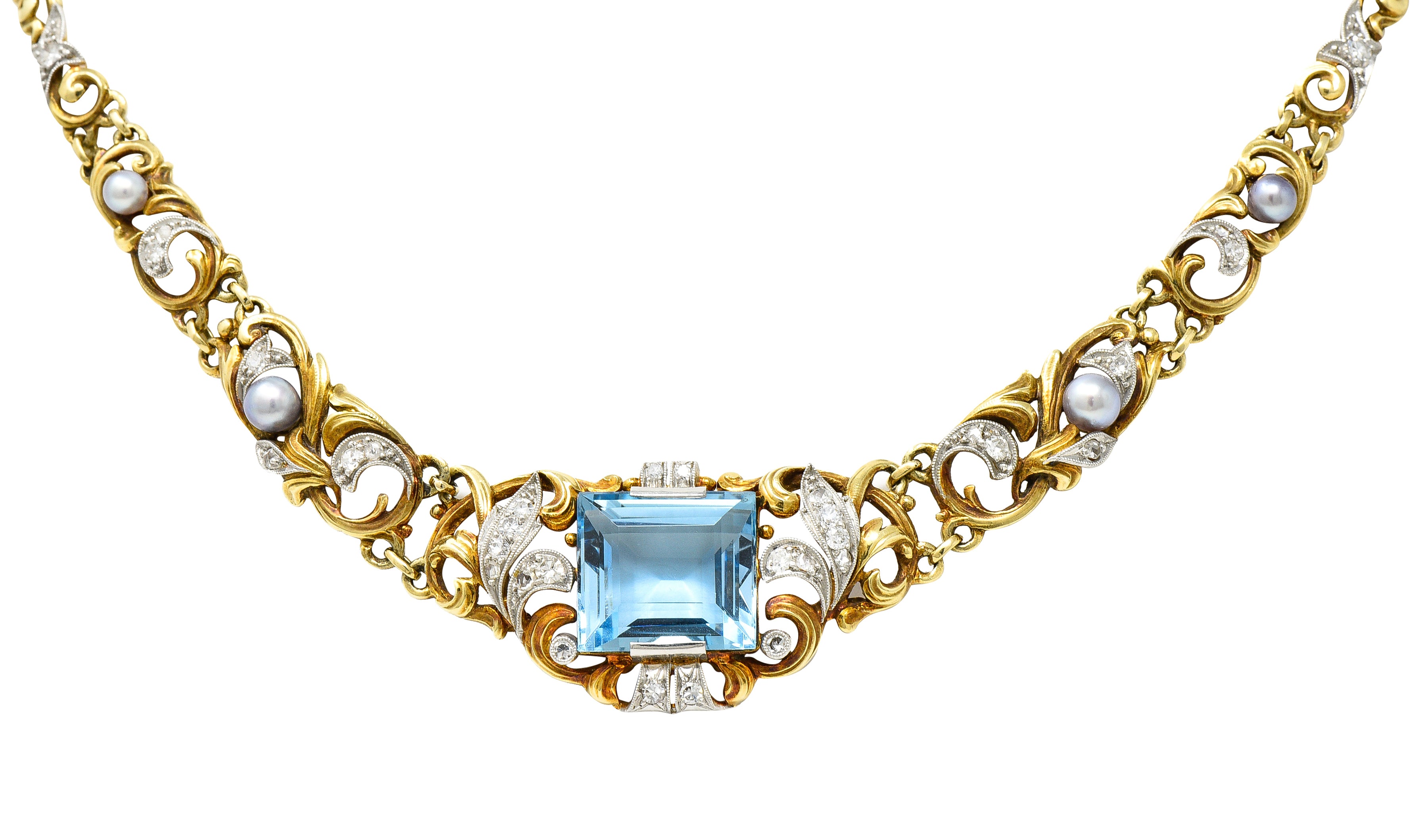 Edwardian 9.71 CTW Step-Cut Aquamarine Diamond Pearl Platinum 14 Karat Yellow Gold Fleur-De-Lis Antique Station Necklace Wilson's Estate Jewelry