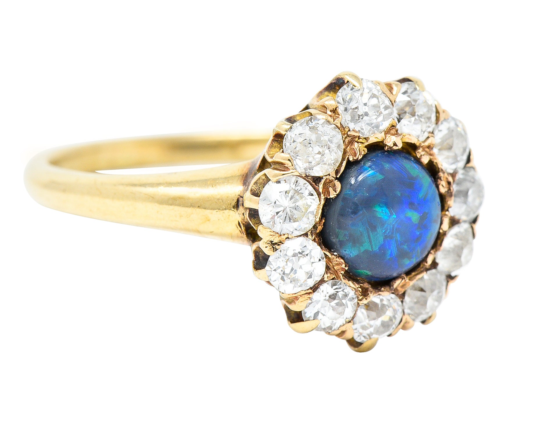 Victorian 0.88 CTW Black Opal Cabochon Old European Cut Diamond 14 Karat Yellow Gold Antique Halo Ring Wilson's Estate Jewelry