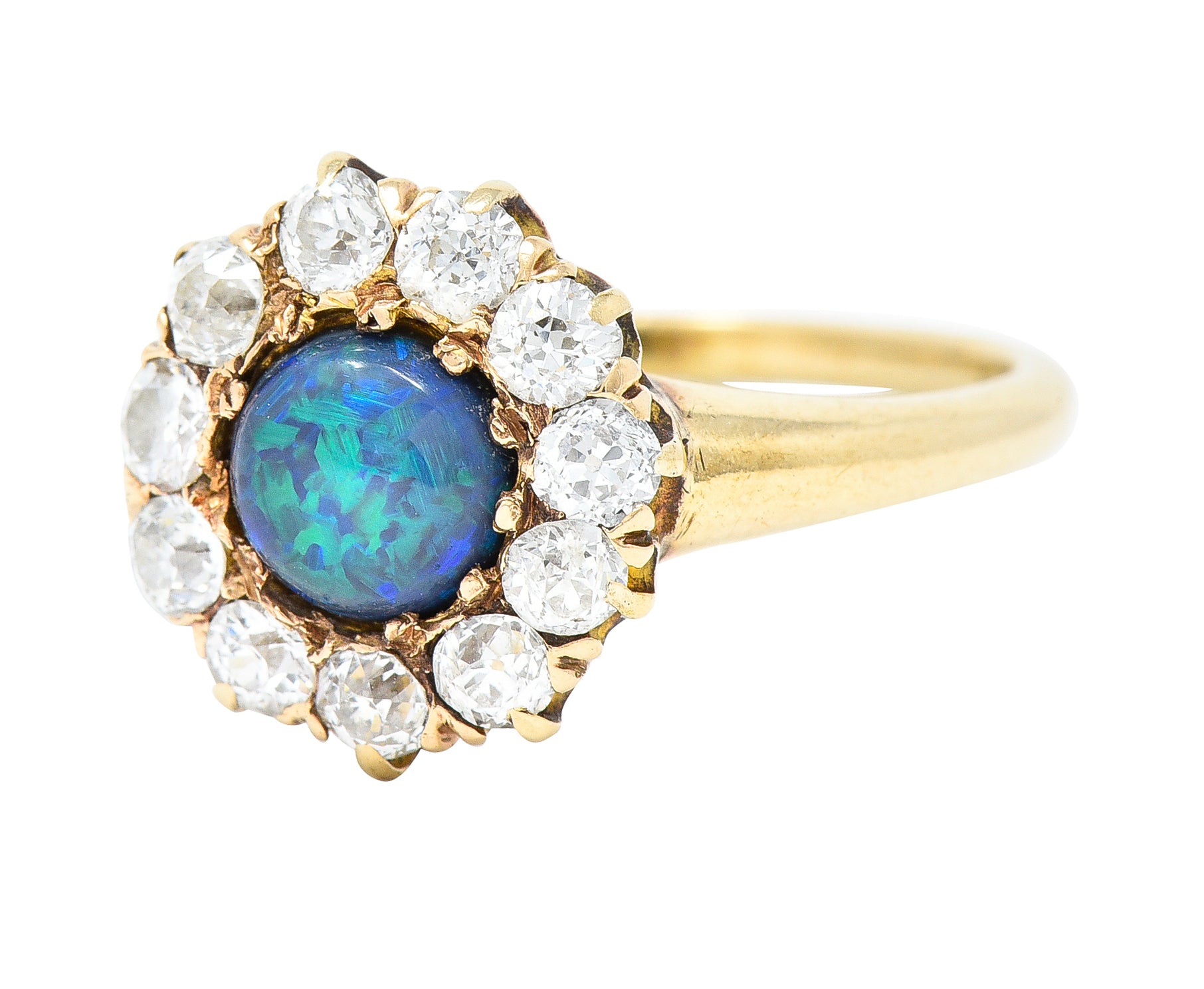 Victorian 0.88 CTW Black Opal Cabochon Old European Cut Diamond 14 Karat Yellow Gold Antique Halo Ring Wilson's Estate Jewelry