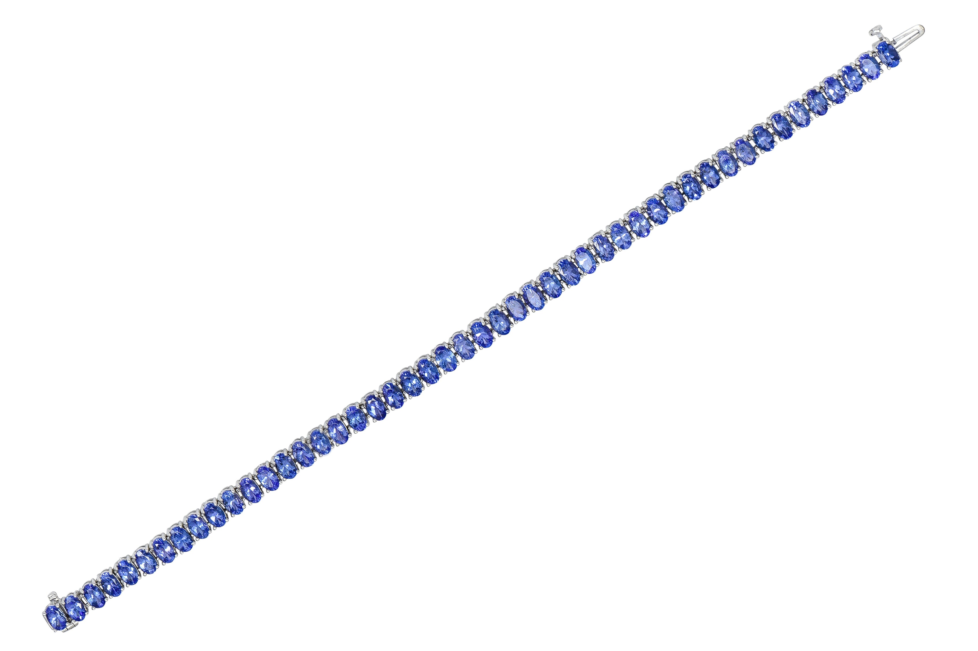 Contemporary 12.00 CTW Oval Cut Tanzanite 14 Karat White Gold Line Bracelet Wilson's Estate Jewelry