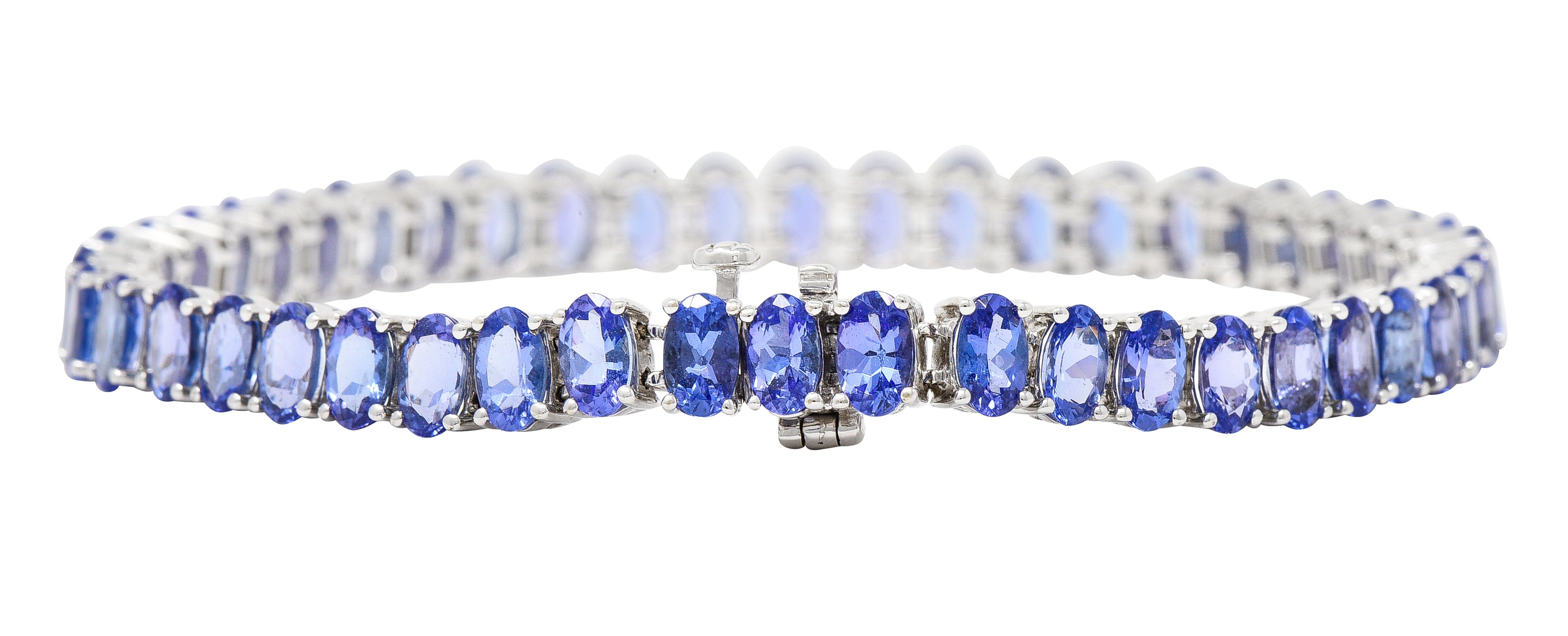 Contemporary 12.00 CTW Oval Cut Tanzanite 14 Karat White Gold Line Bracelet Wilson's Estate Jewelry