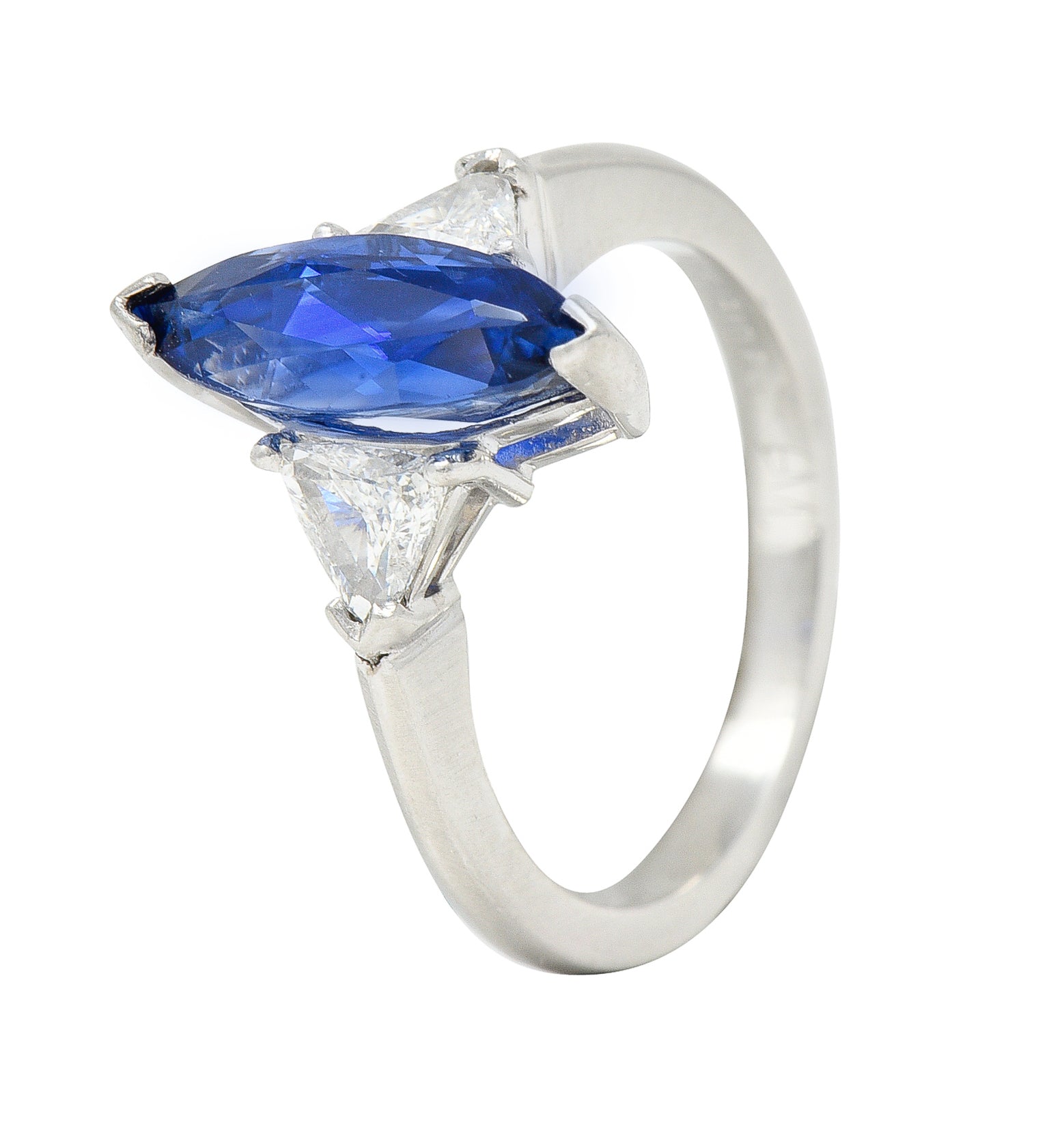 Contemporary 2.44 CTW Marquise Cut Sapphire Trillion Cut Diamond Platinum Three Stone Ring Wilson's Estate Jewelry