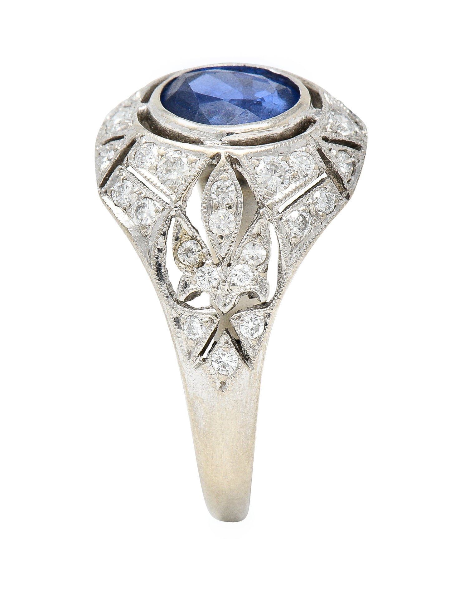 1960's Art Deco Revival 1.72 CTW Oval Cut Sapphire Diamond 14 Karat White Gold Fleur-De-Lis Vintage Bombay Dinner Ring Wilson's Estate Jewelry