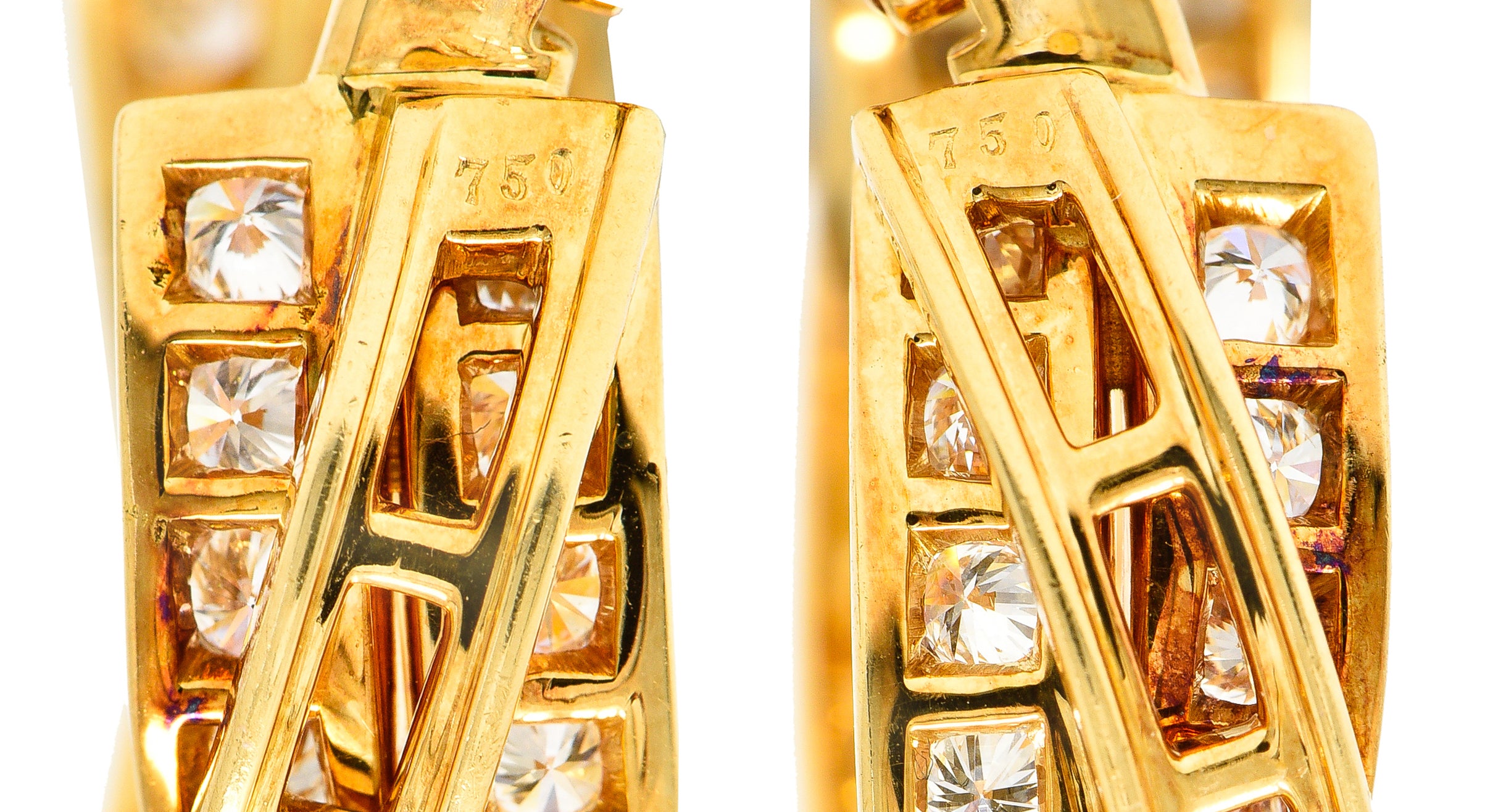 Cartier French 1990's 6.15 CTW Diamond 18 Karat Yellow Gold Twisting Trinity Inside/Outside J-Hoop Vintage Earrings Wilson's Estate Jewelry