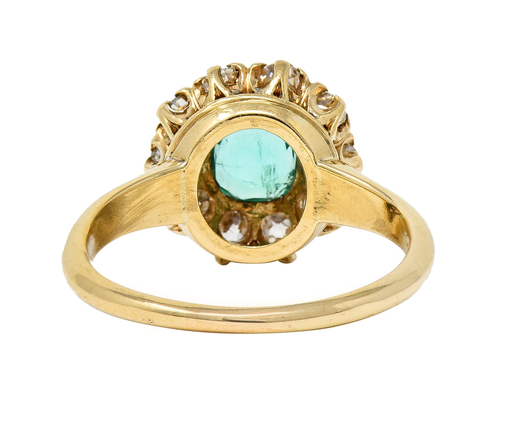 Victorian 1.52 CTW Cushion Cut Emerald Old Mine Cut Diamond 14 Karat Yellow Gold Antique Halo Ring Wilson's Estate Jewelry