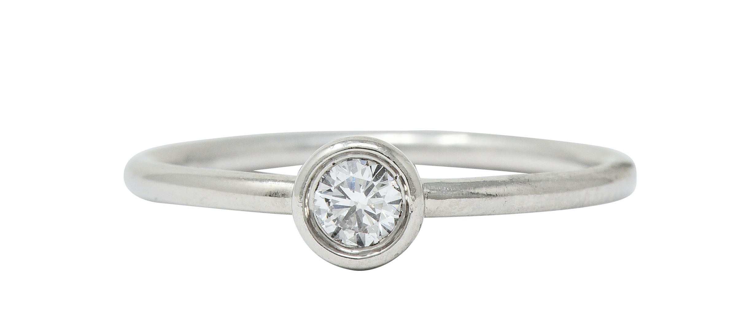 Tiffany & Co. Contemporary Diamond Platinum Bezet Solitaire RingRing - Wilson's Estate Jewelry